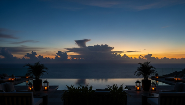 Luxury resort terrace overlooking ocean at dusk