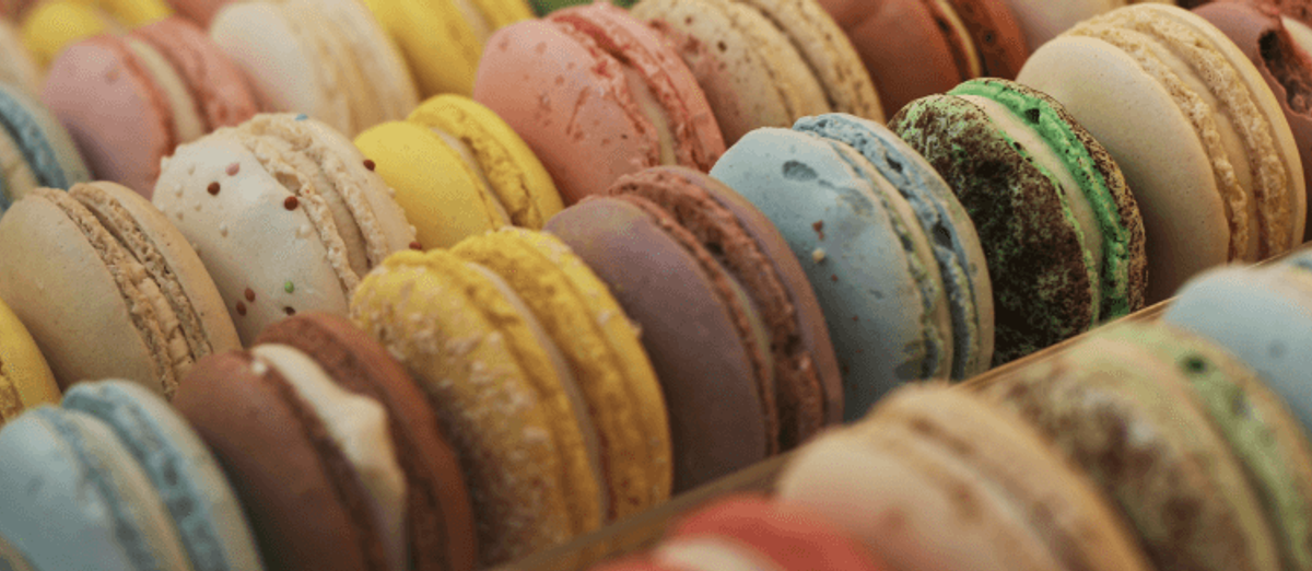 Colorful assortment of macarons in a row