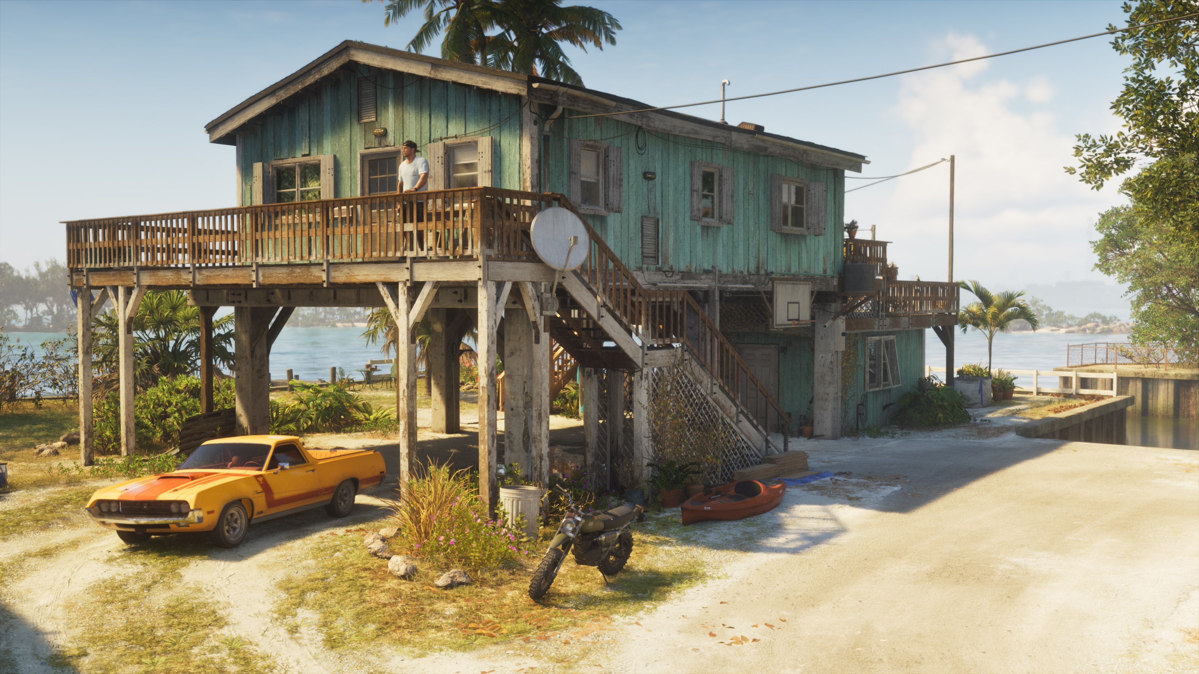 A Leonida stilt house with a car, motorcycle and kayak parked beneath it in official Grand Theft Auto VI press art