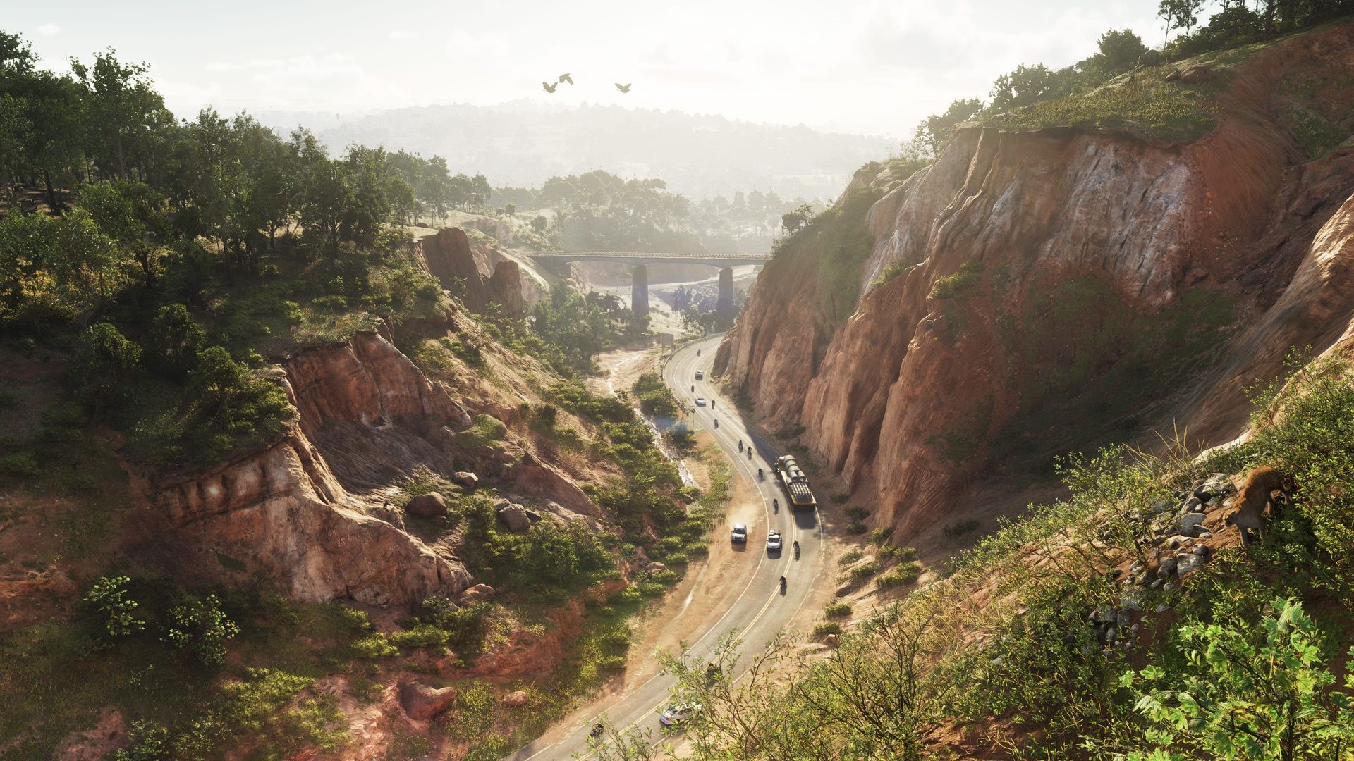 A winding highway through a forested red-rock canyon in Mount Kalaga National Park in Grand Theft Auto VI