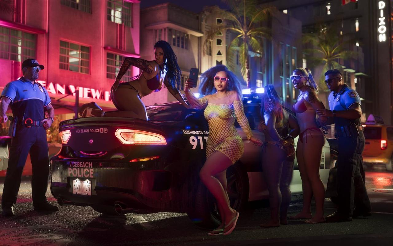 A Vice Beach Police cruiser parked at night on a neon-lit Vice City street with officers and partygoers around it — official Grand Theft Auto VI screenshot