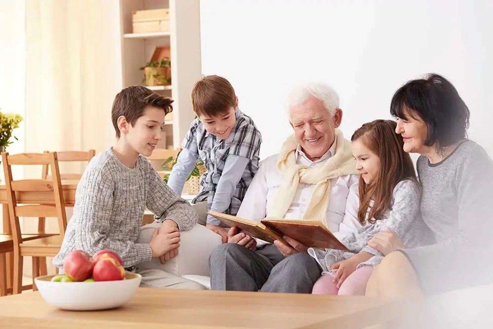 Family reading a book all together