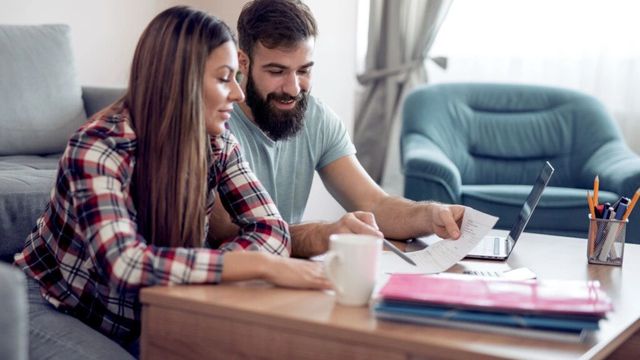Married couple looking at finances