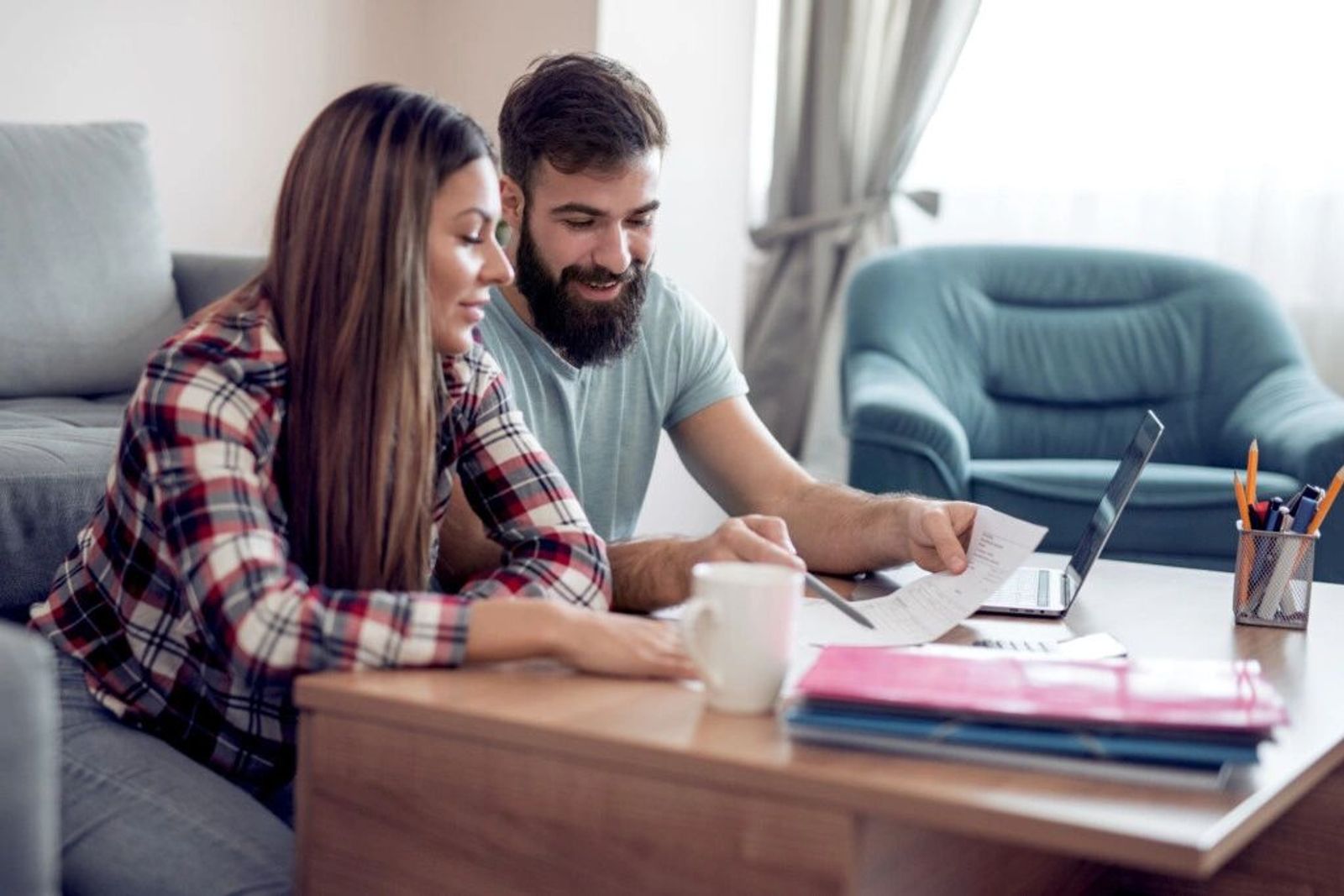 Married couple looking at finances