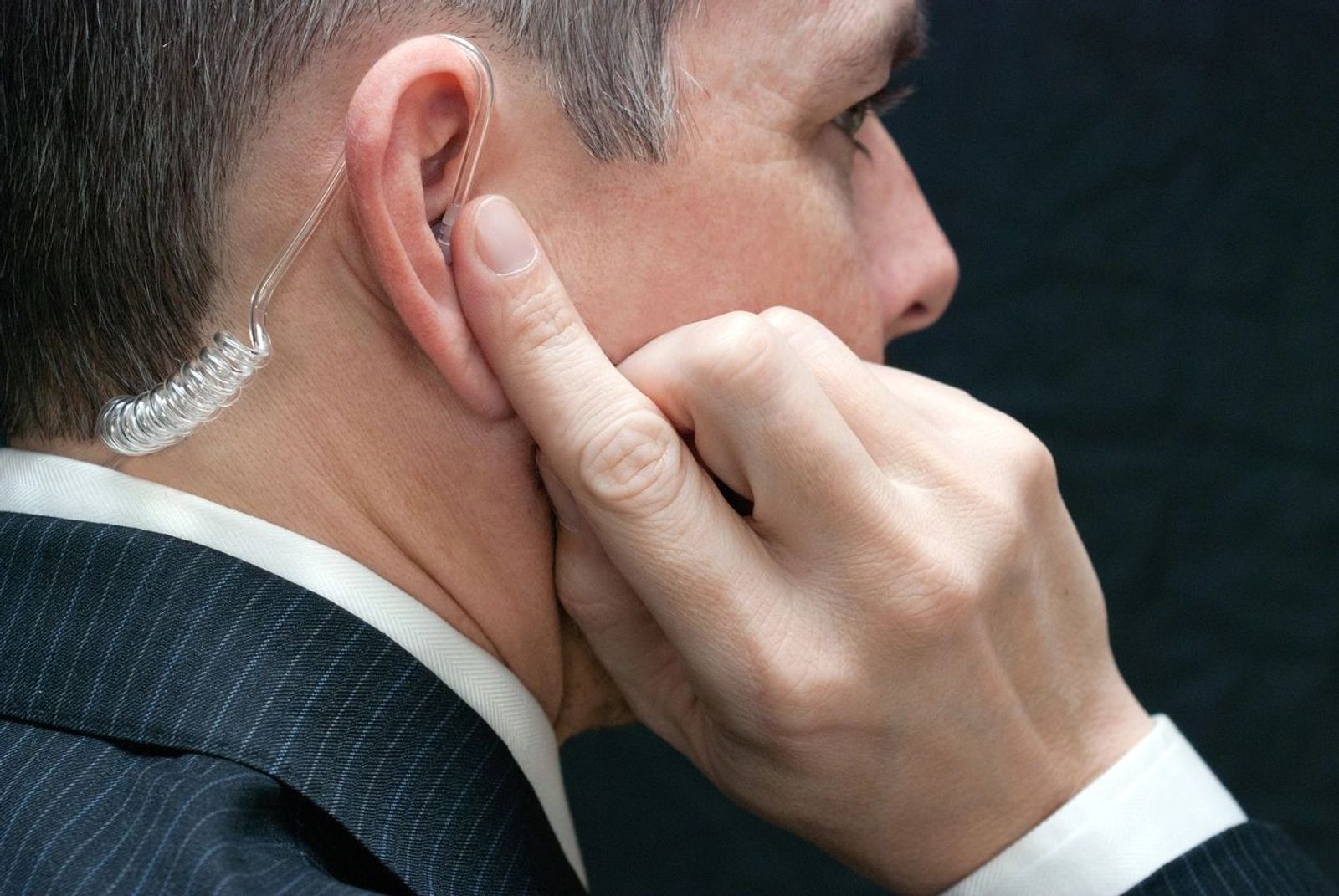 Secret service talking on earpiece
