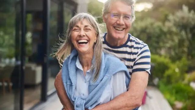 Happy Retired couple smiling