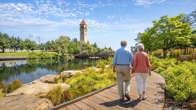 https://Couple walking near Riverfront Park in Spokane