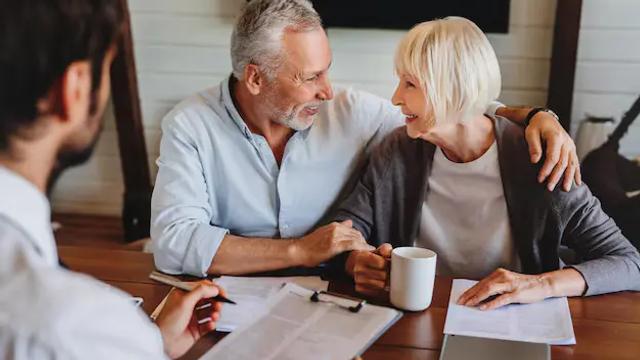 Spokane financial advisor reviewing a retirement income plan with a retired couple