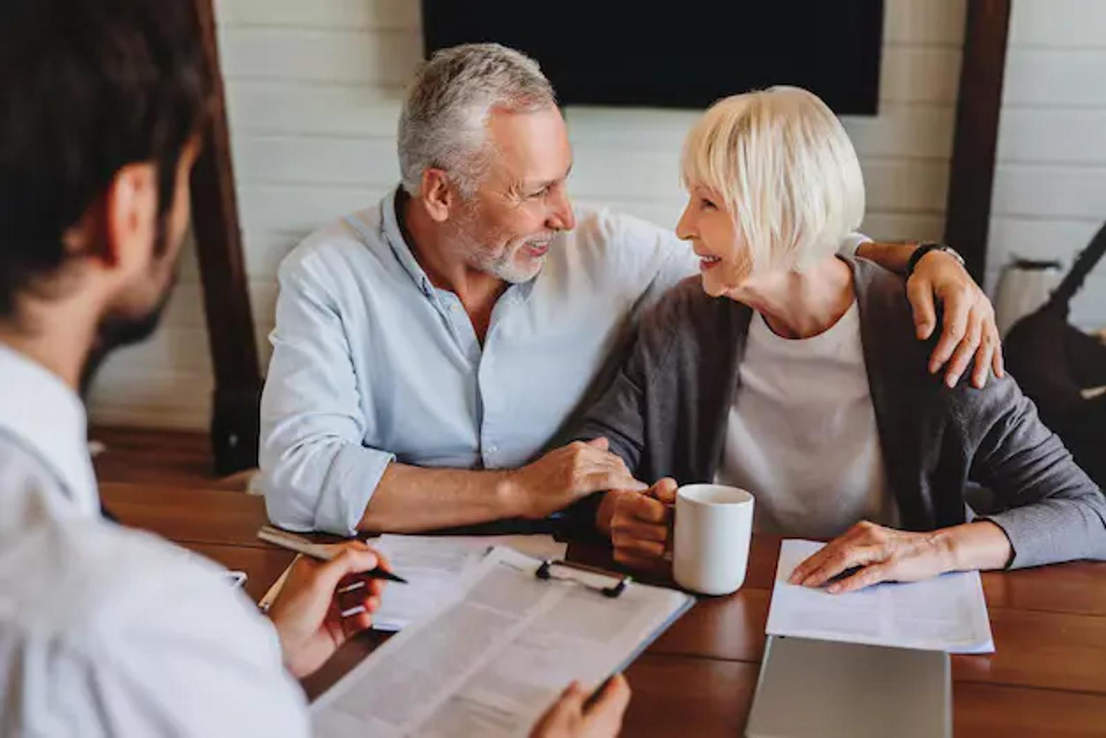 Spokane financial advisor reviewing a retirement income plan with a retired couple