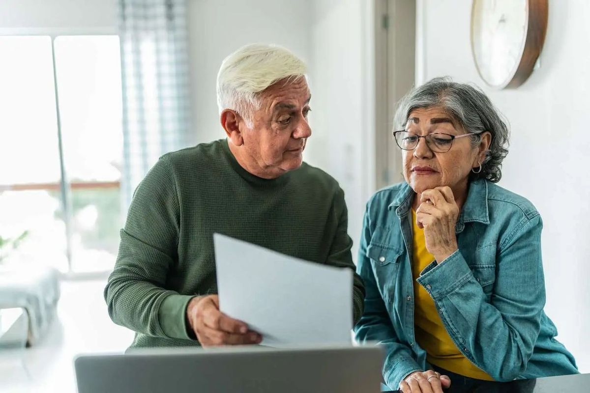 Retired couple looking at a financial plan