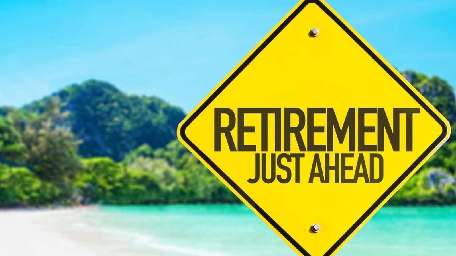 Retirement just ahead sign on a beach