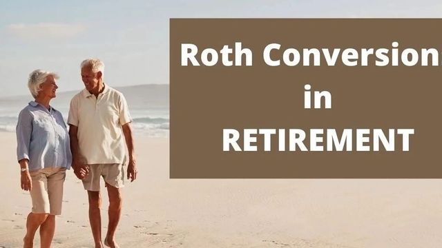 Retired couple walking on the beach