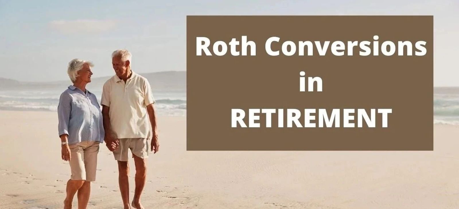Retired couple walking on the beach