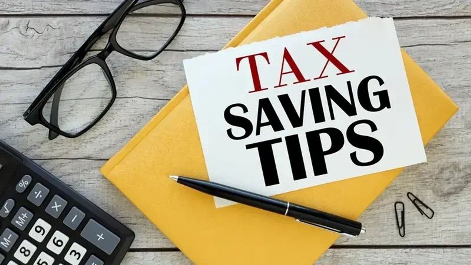 Tax Saving Tips folder on a desk