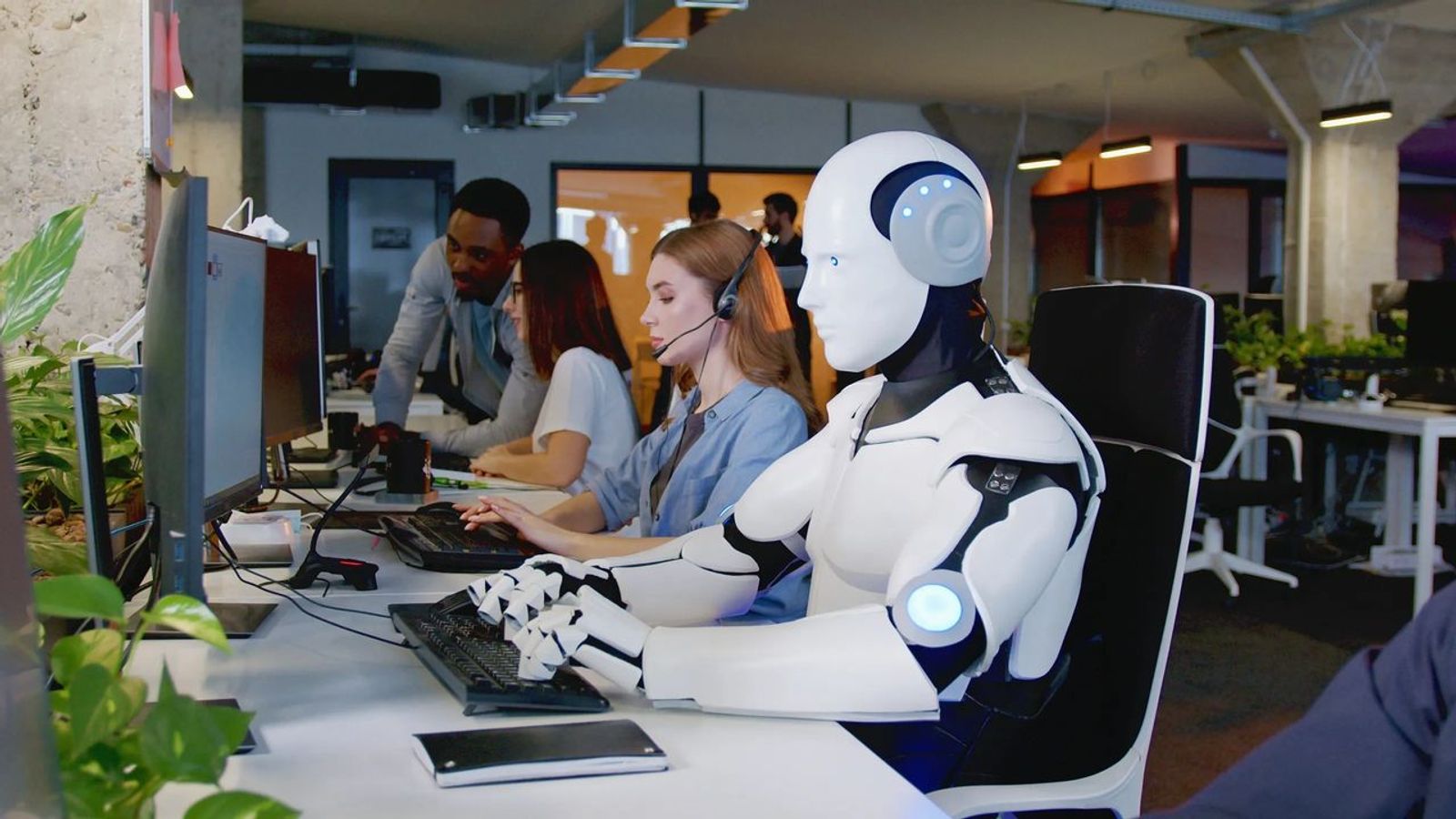 robot on a computer in the workplace