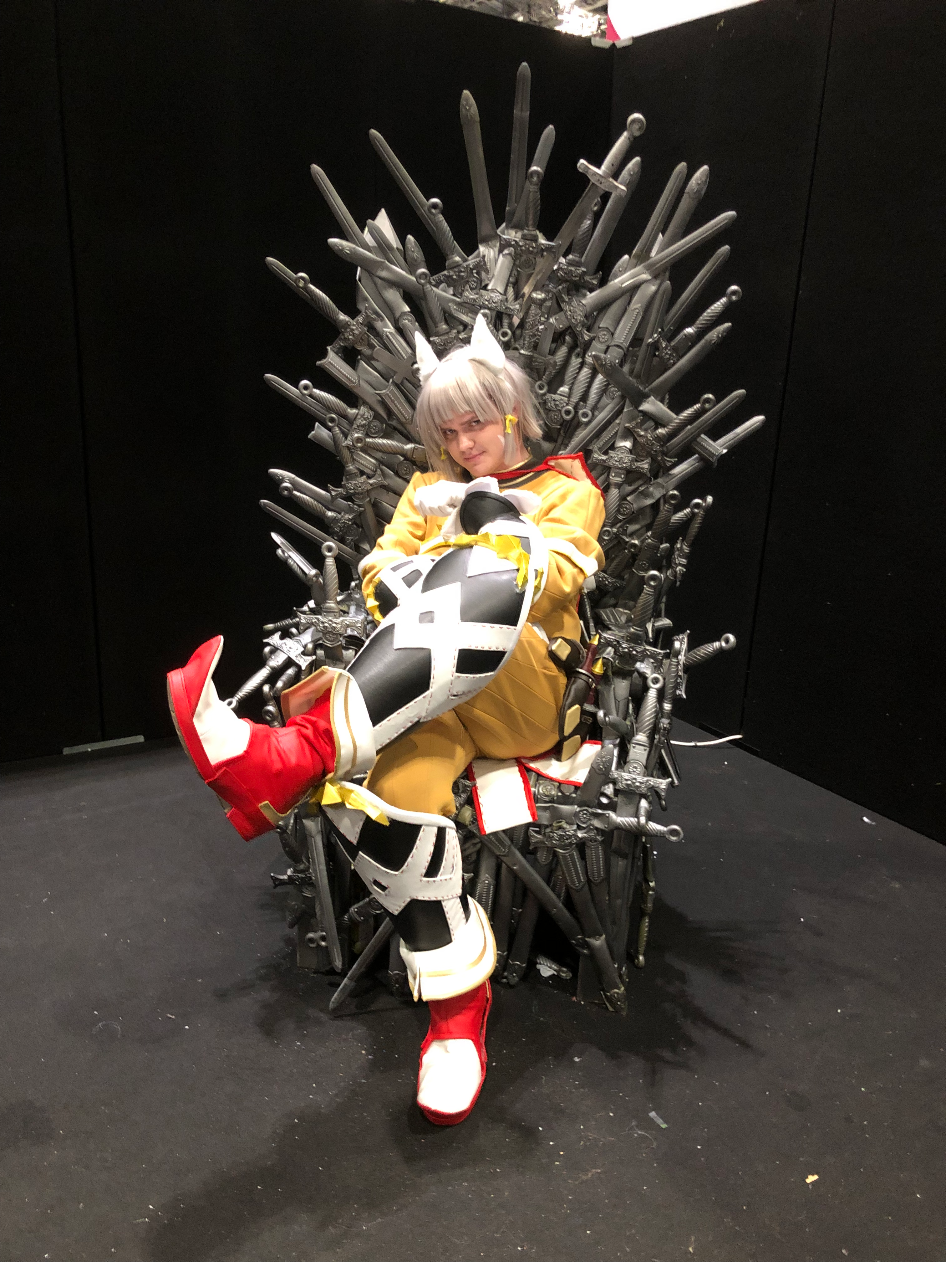 Nia sitting on the Iron Throne