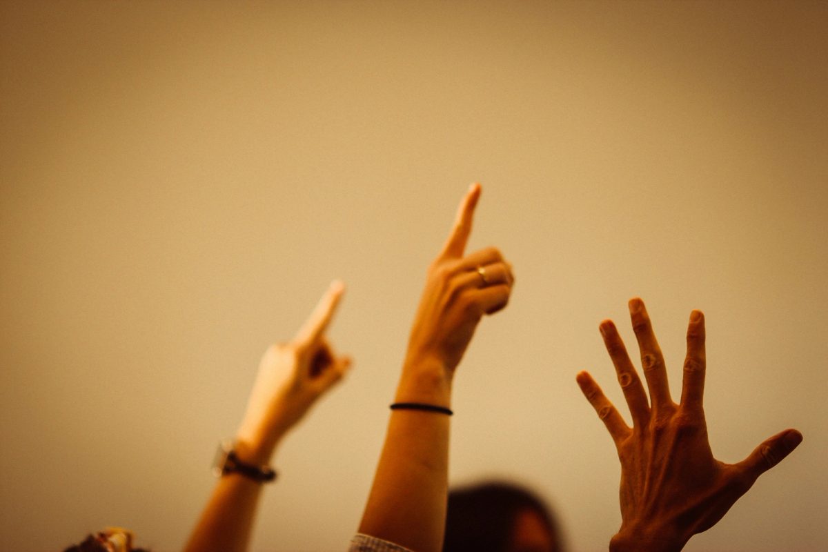raising hand to ask question