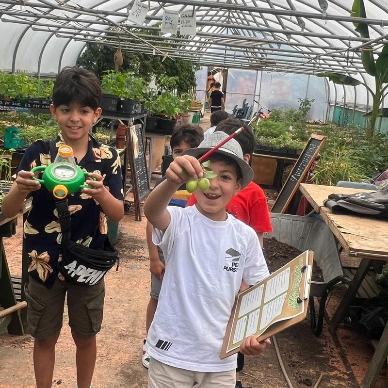 Kids gardening outdoors.