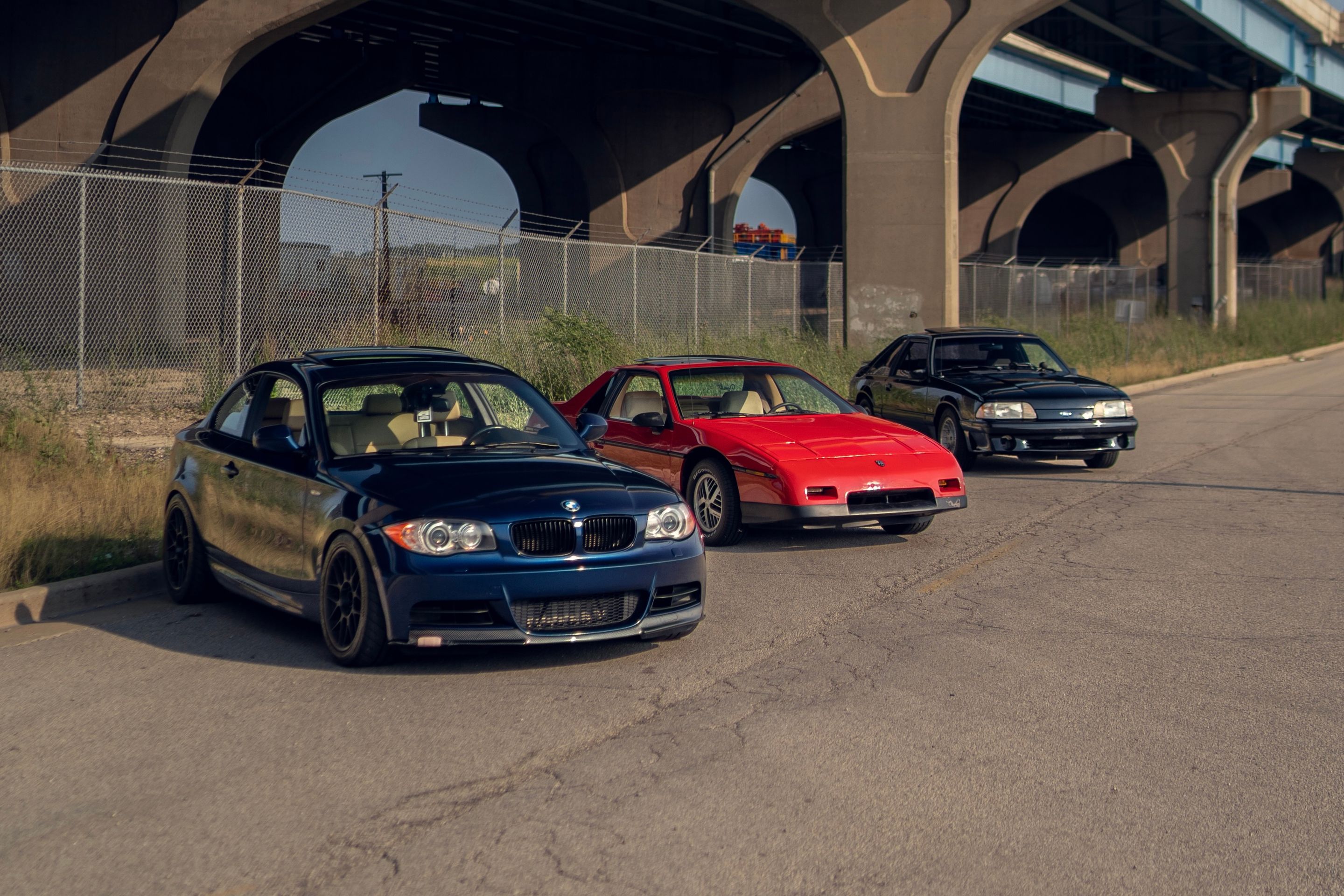 Blue BMW E82 Coupe 1 Series with 17" ARC-8 Apex wheels in Satin Black