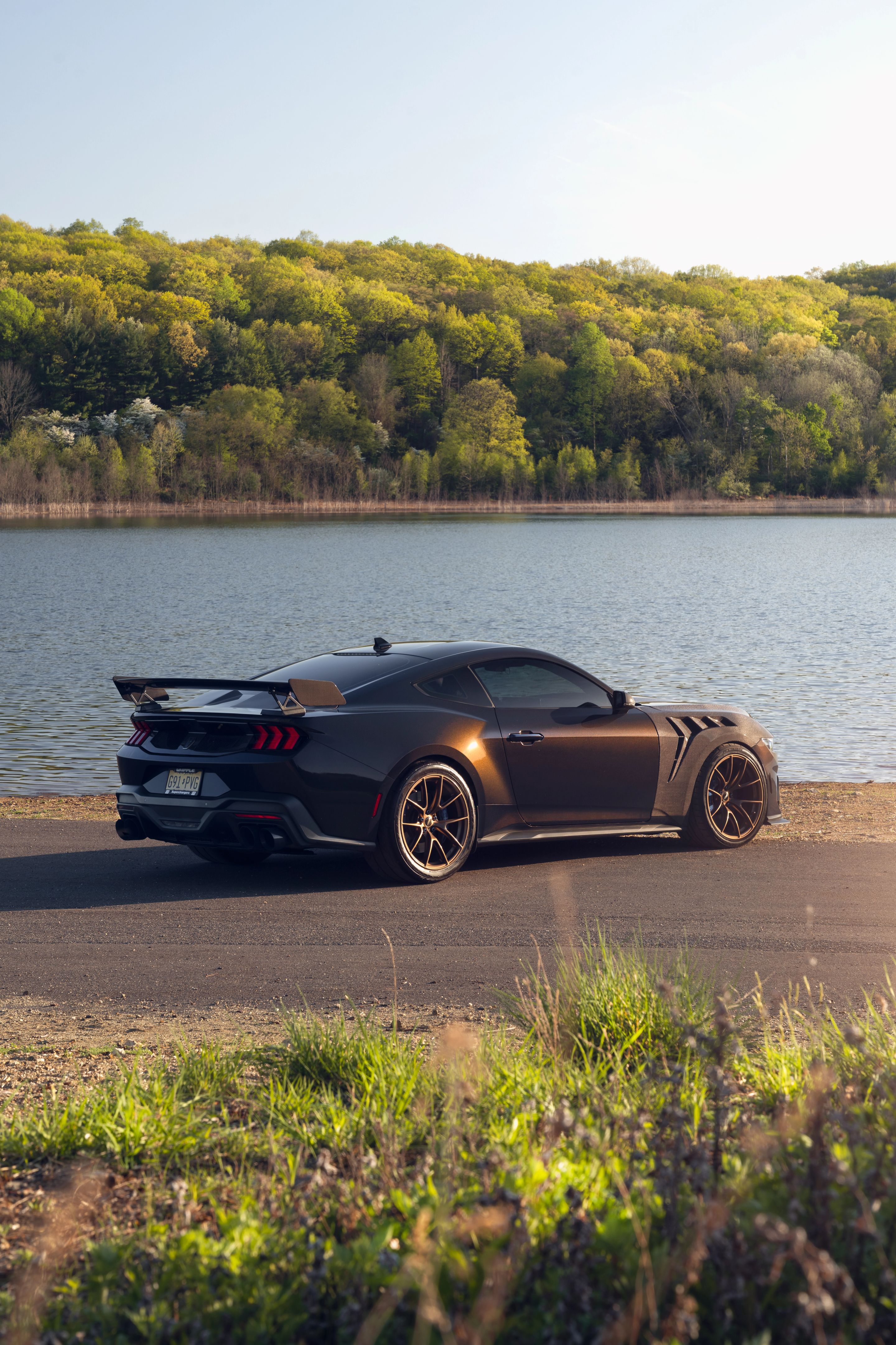Orange Ford S650 Mustang Dark Horse with 20" VS-5RS Apex wheels in Satin Bronze