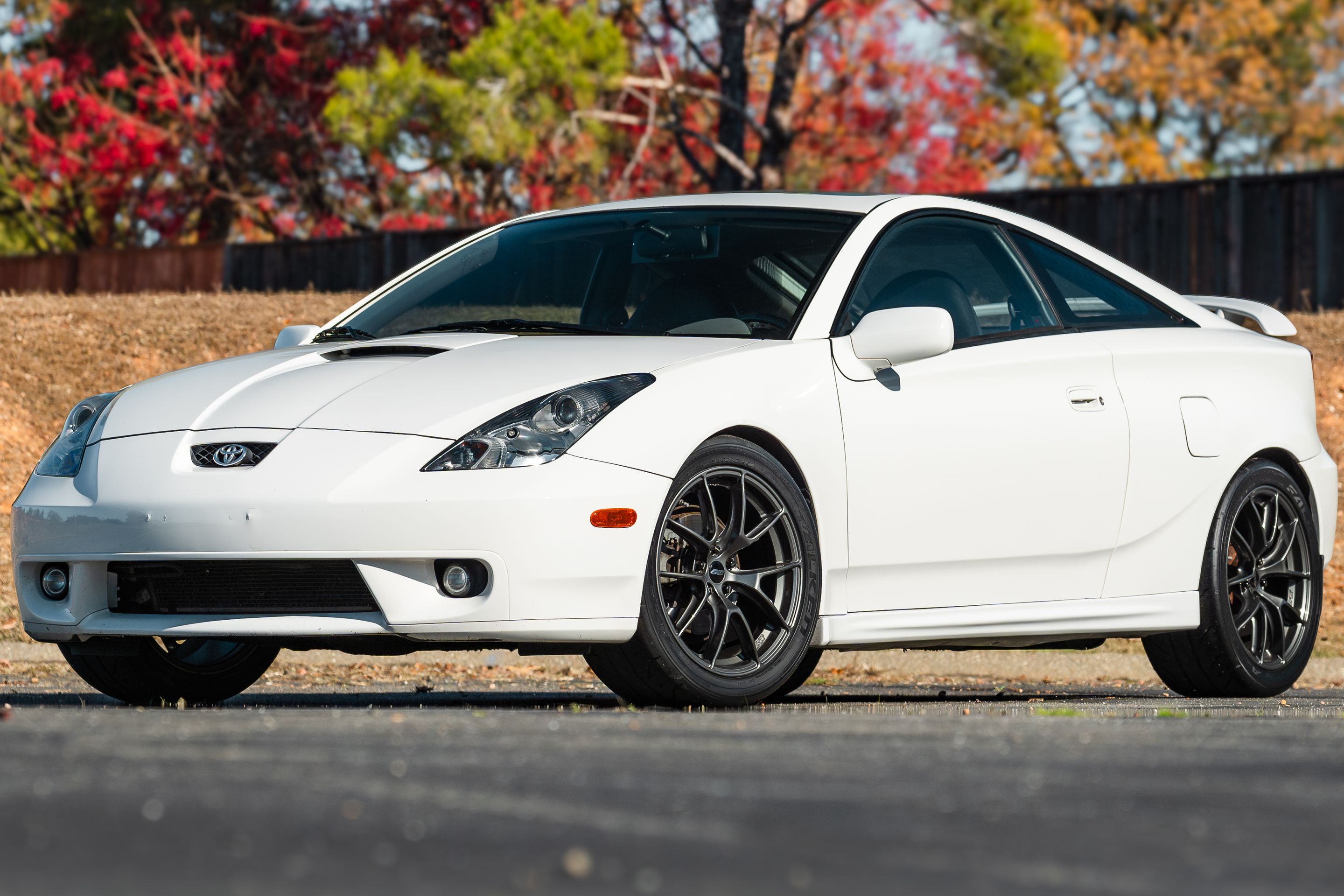 White Toyota 7th Gen Celica with 17" VS-5RS Apex wheels in Anthracite