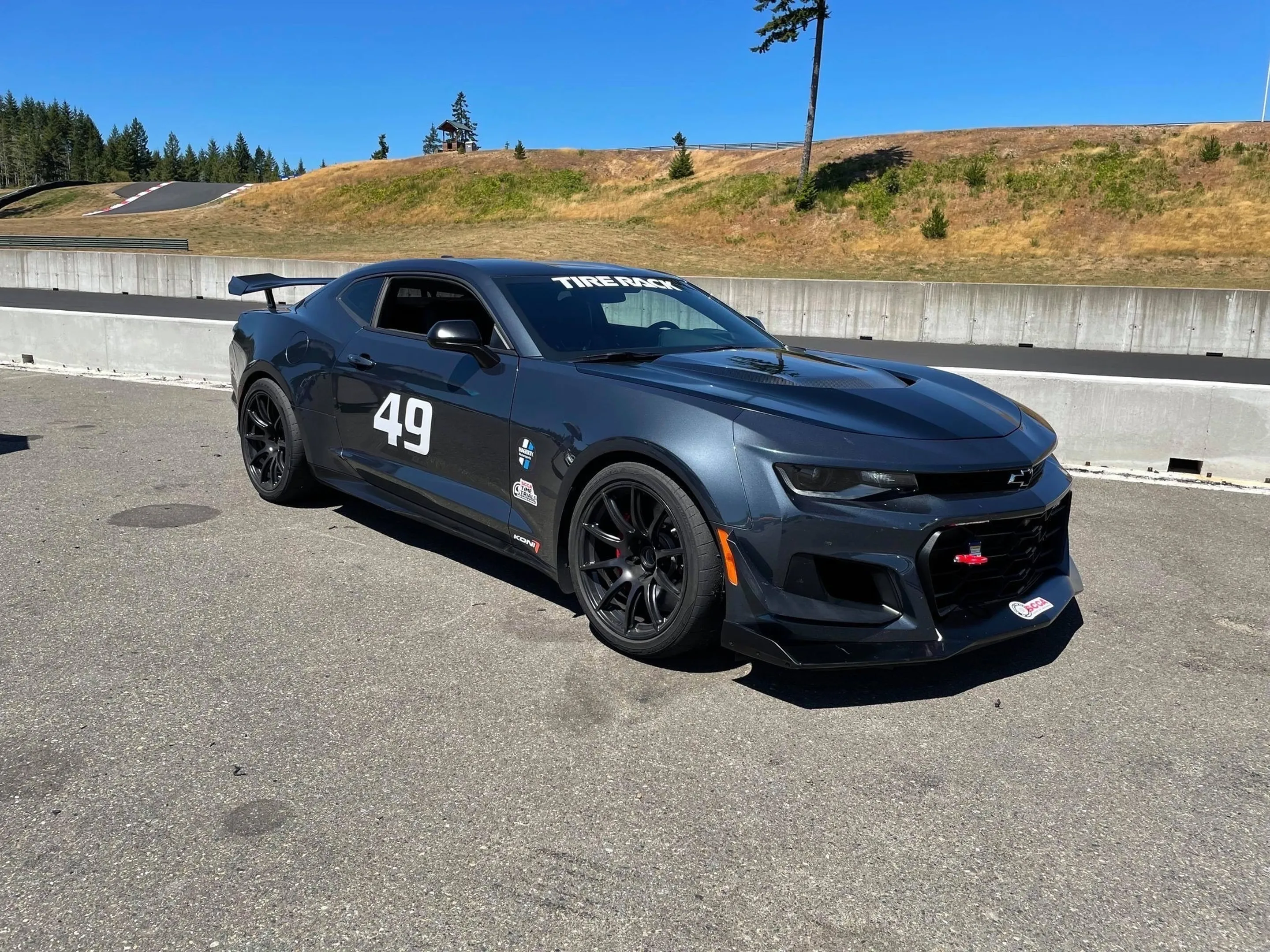 Grey Chevrolet 6th Gen Camaro ZL1 1LE with 19" SM-10 Apex wheels in Satin Black