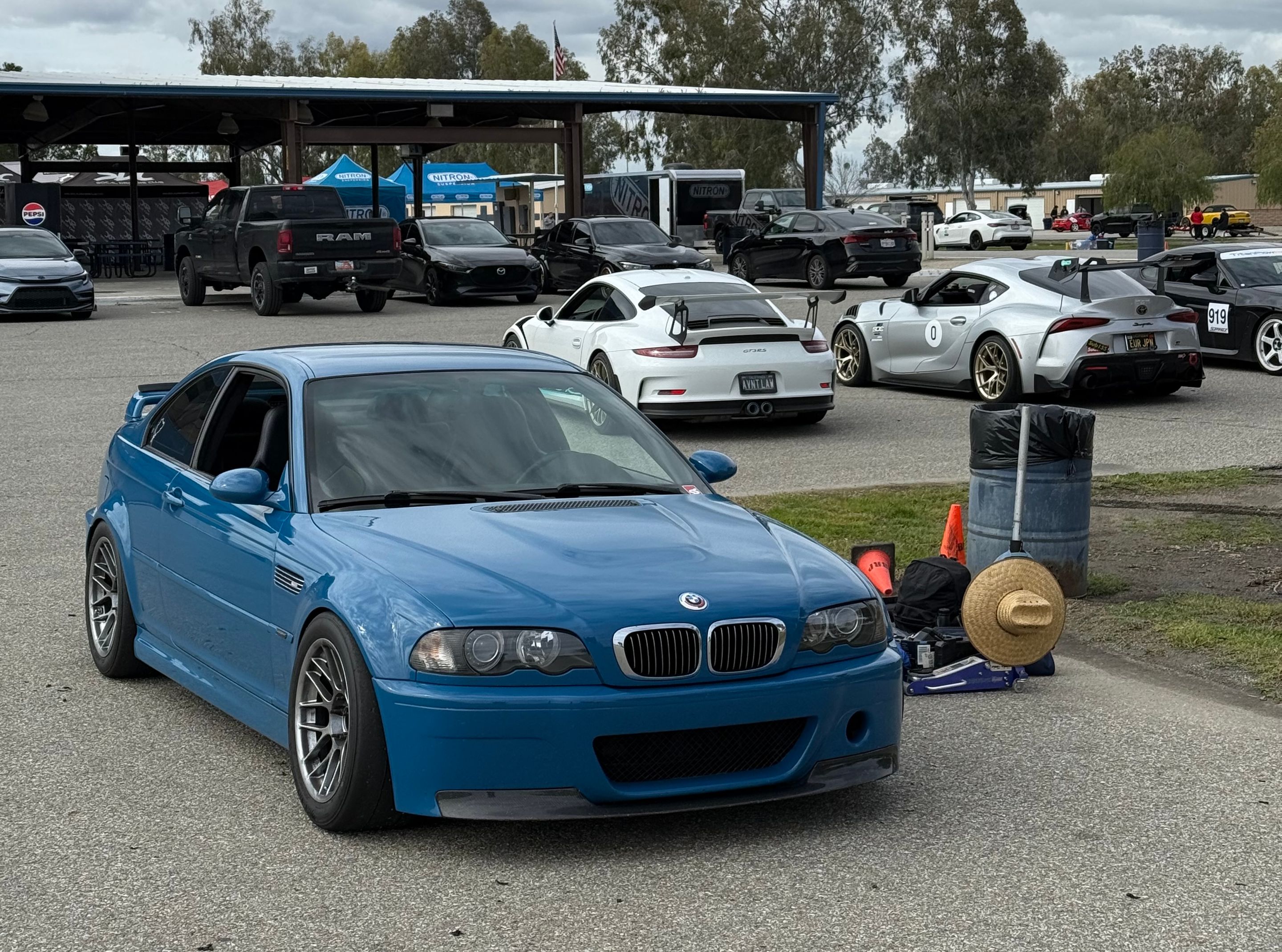Blue BMW E46 M3 with 17" ARC-8 Apex wheels in Hyper Black