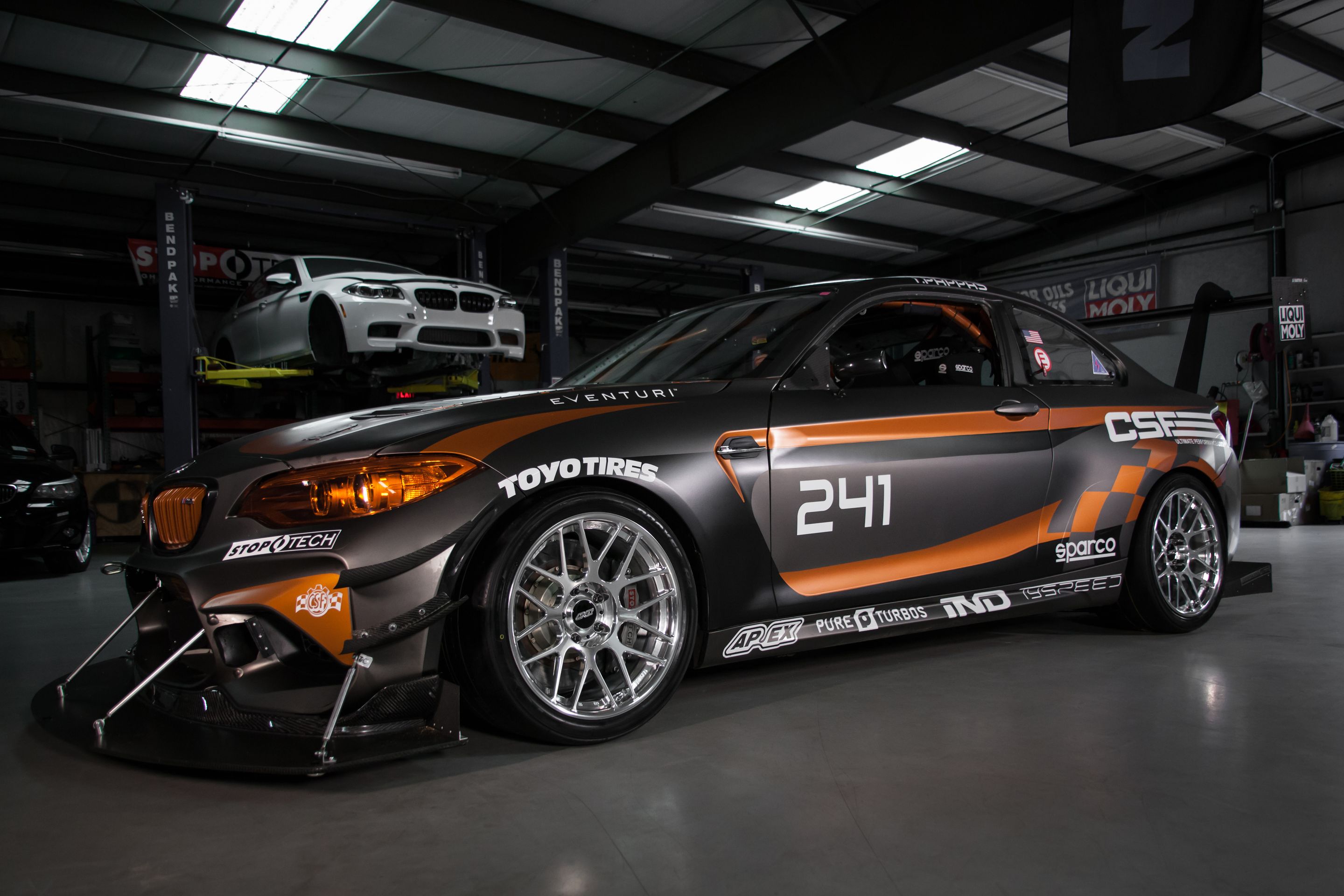 Multicolor BMW F87 M2 with 18" ARC-8R Apex wheels in Polished