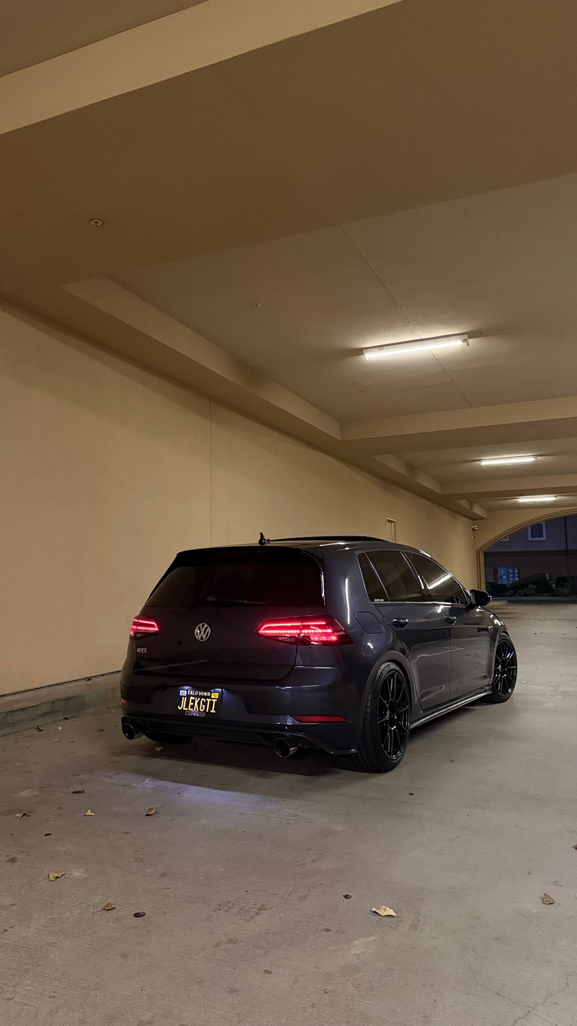Grey VW MK7 GTI with 18" SM-10 Apex wheels in Satin Black