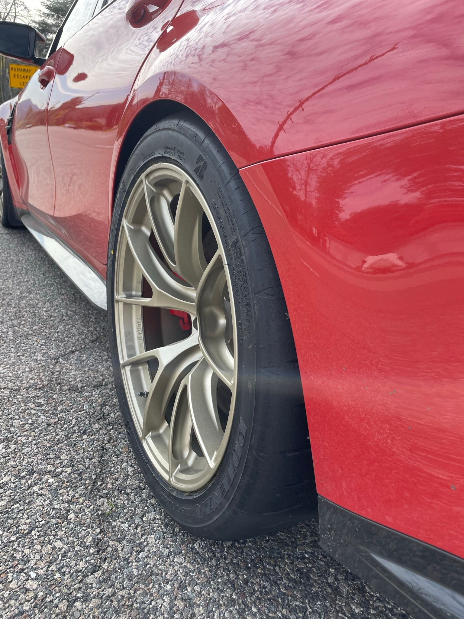 Red BMW G80 M3 with 19" VS-5RS Apex wheels in Motorsport Gold