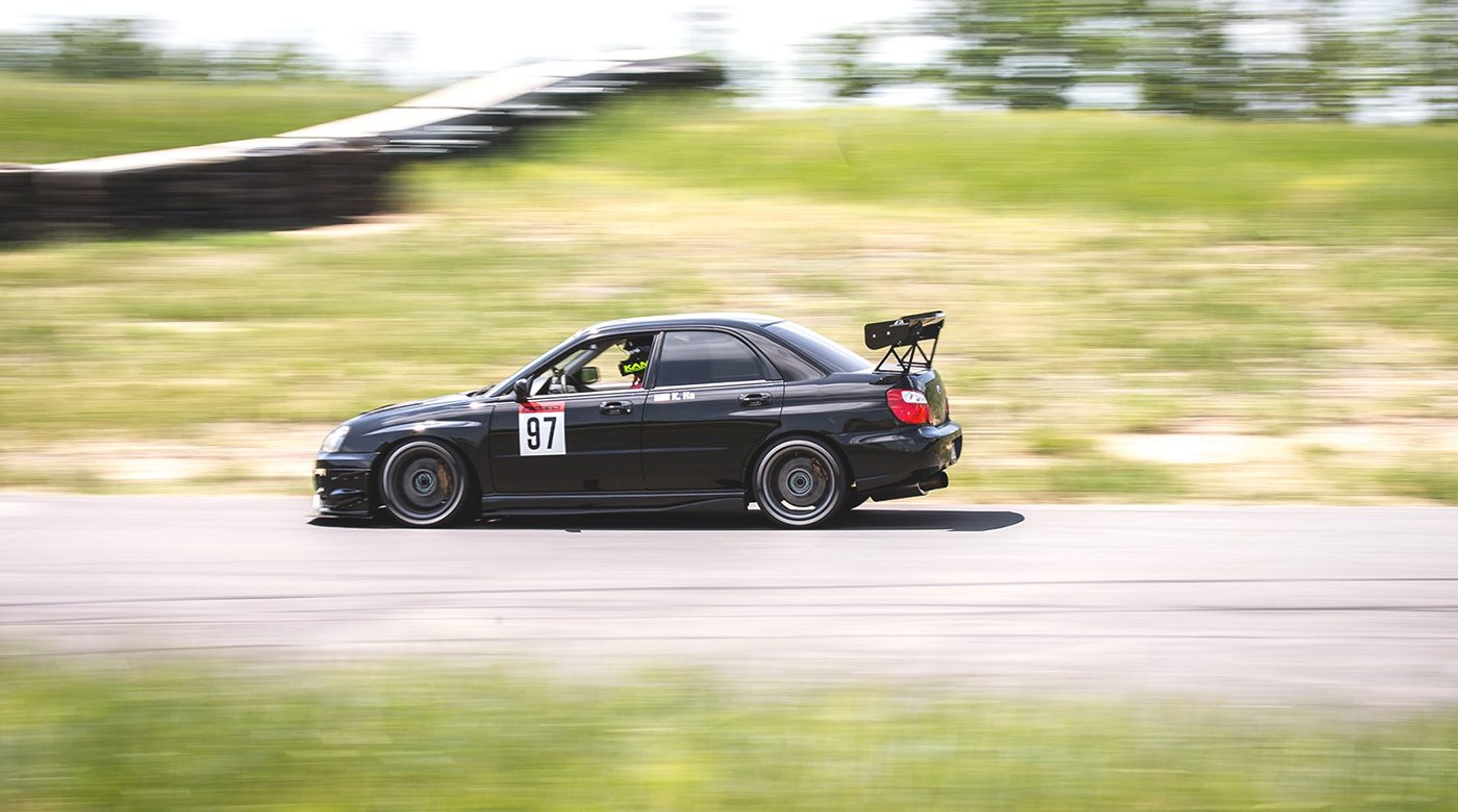 Black Subaru GD WRX Sedan with 17" ARC-8 Apex wheels in Anthracite