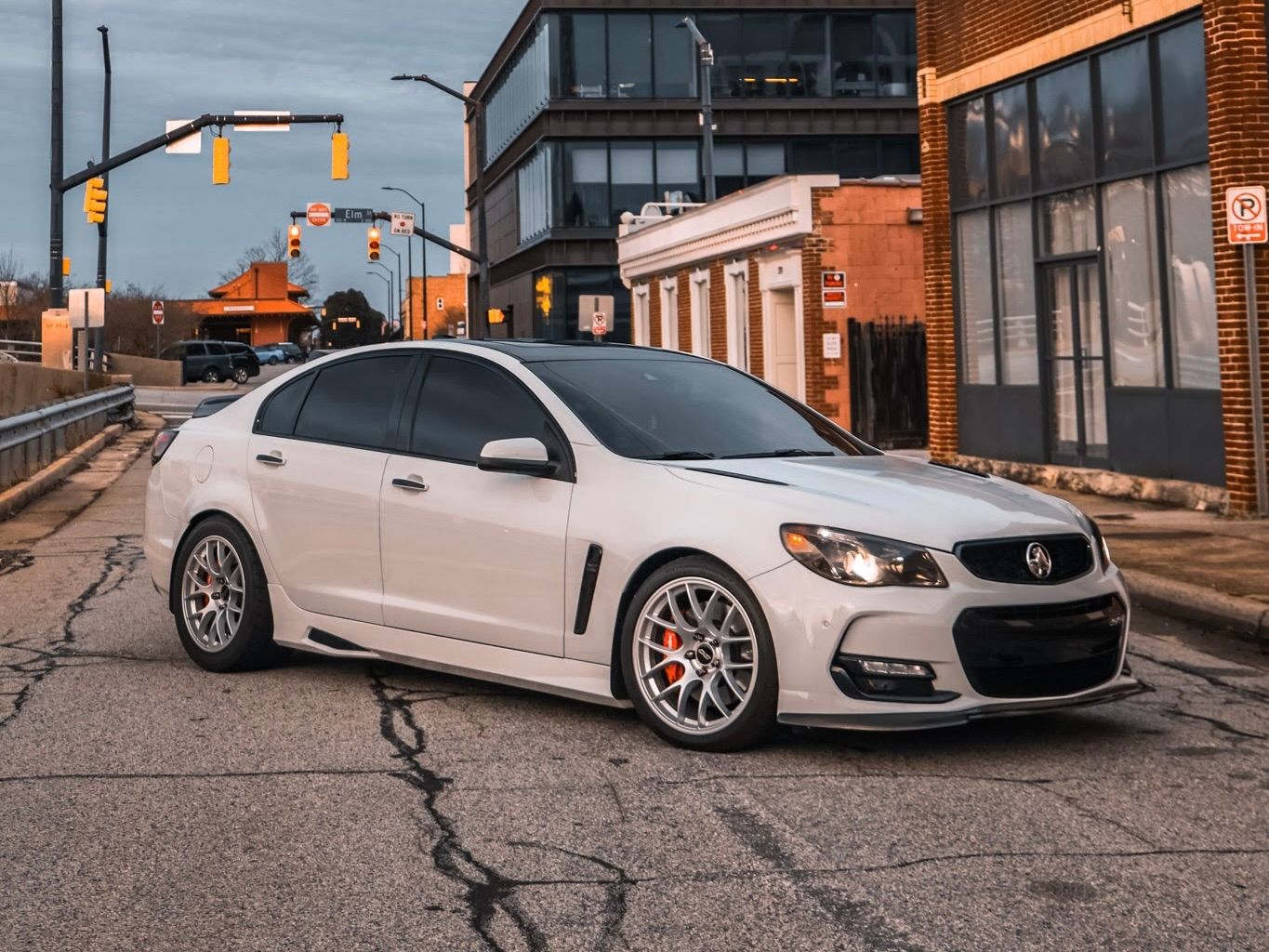 White Chevrolet SS with 19"/18" EC-7 Apex wheels in Race Silver