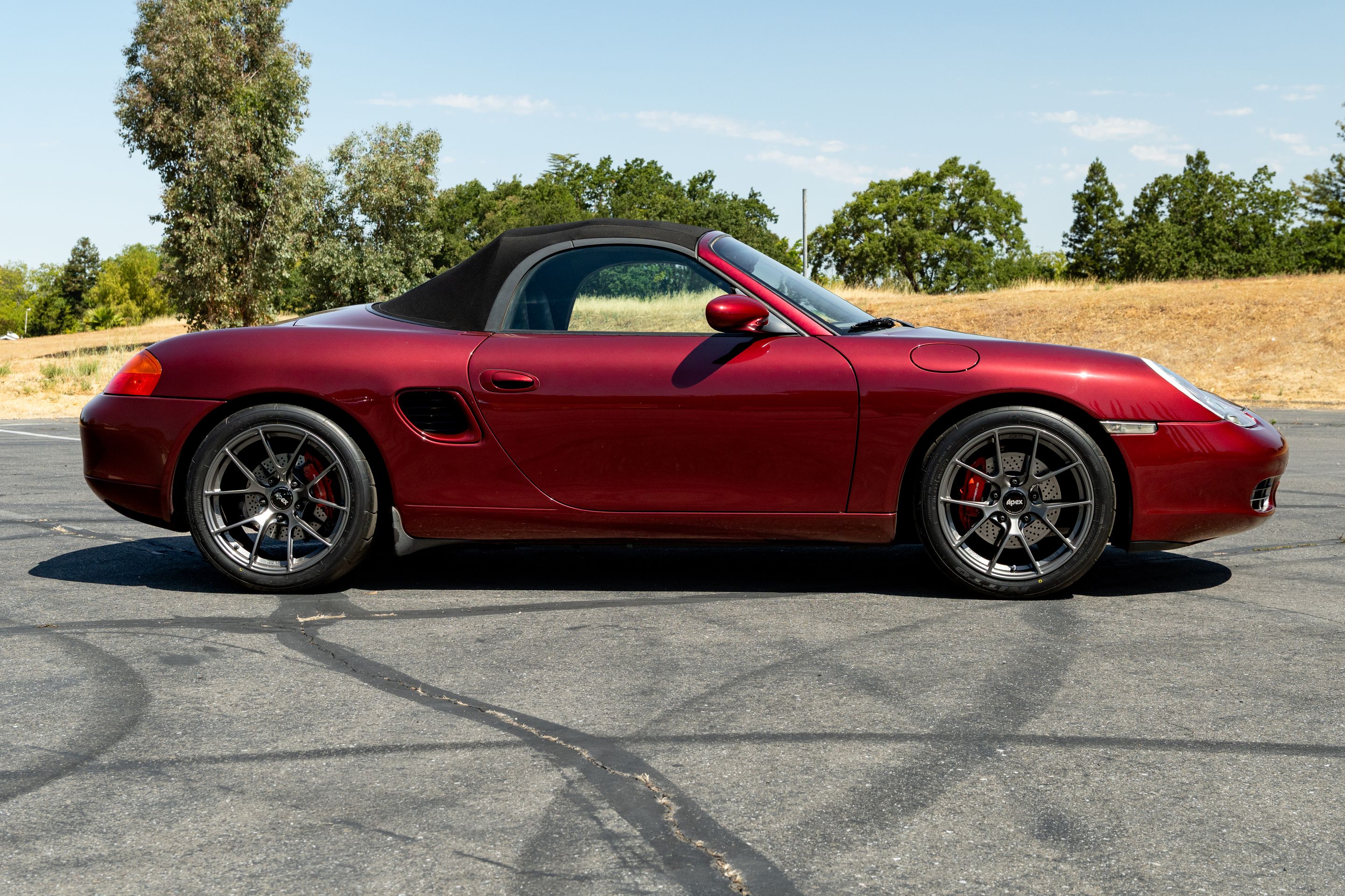 Red Porsche 986 Boxster with 18" VS-5RS Apex wheels in Anthracite