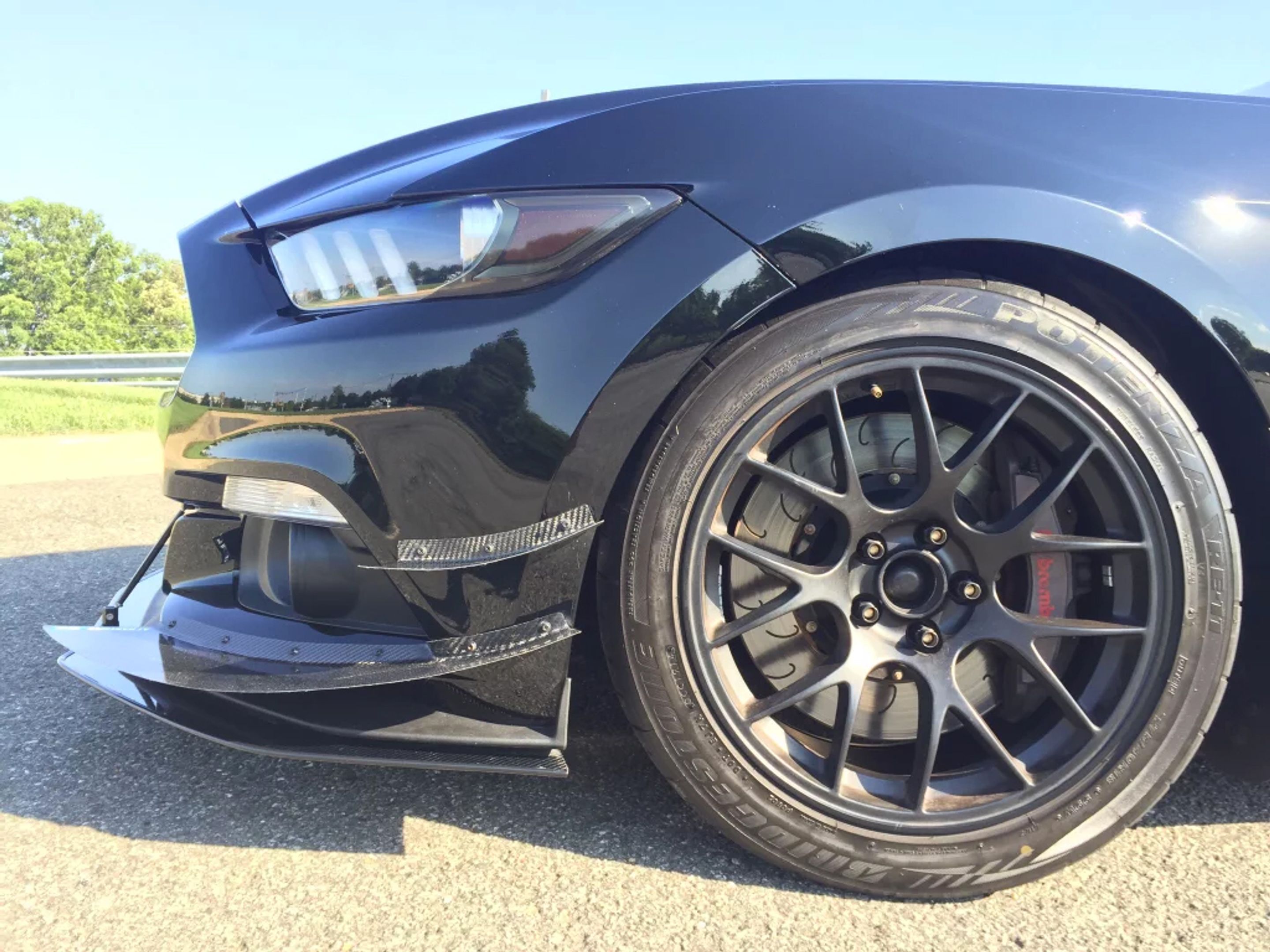 Black Ford S550 Mustang GT with 18" EC-7 Apex wheels in Satin Black