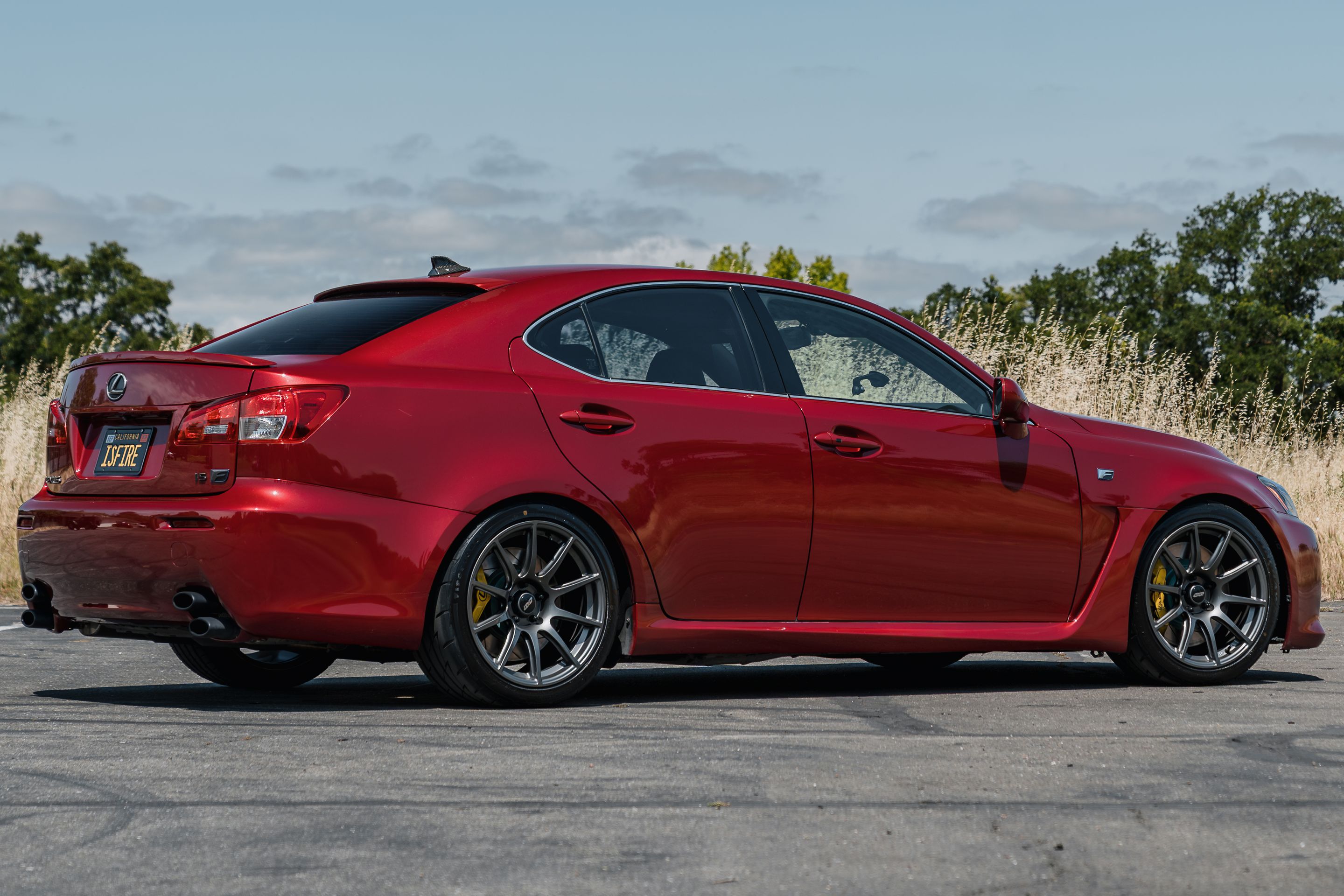 Red Lexus USE20 IS-F with 18" SM-10 Apex wheels in Anthracite