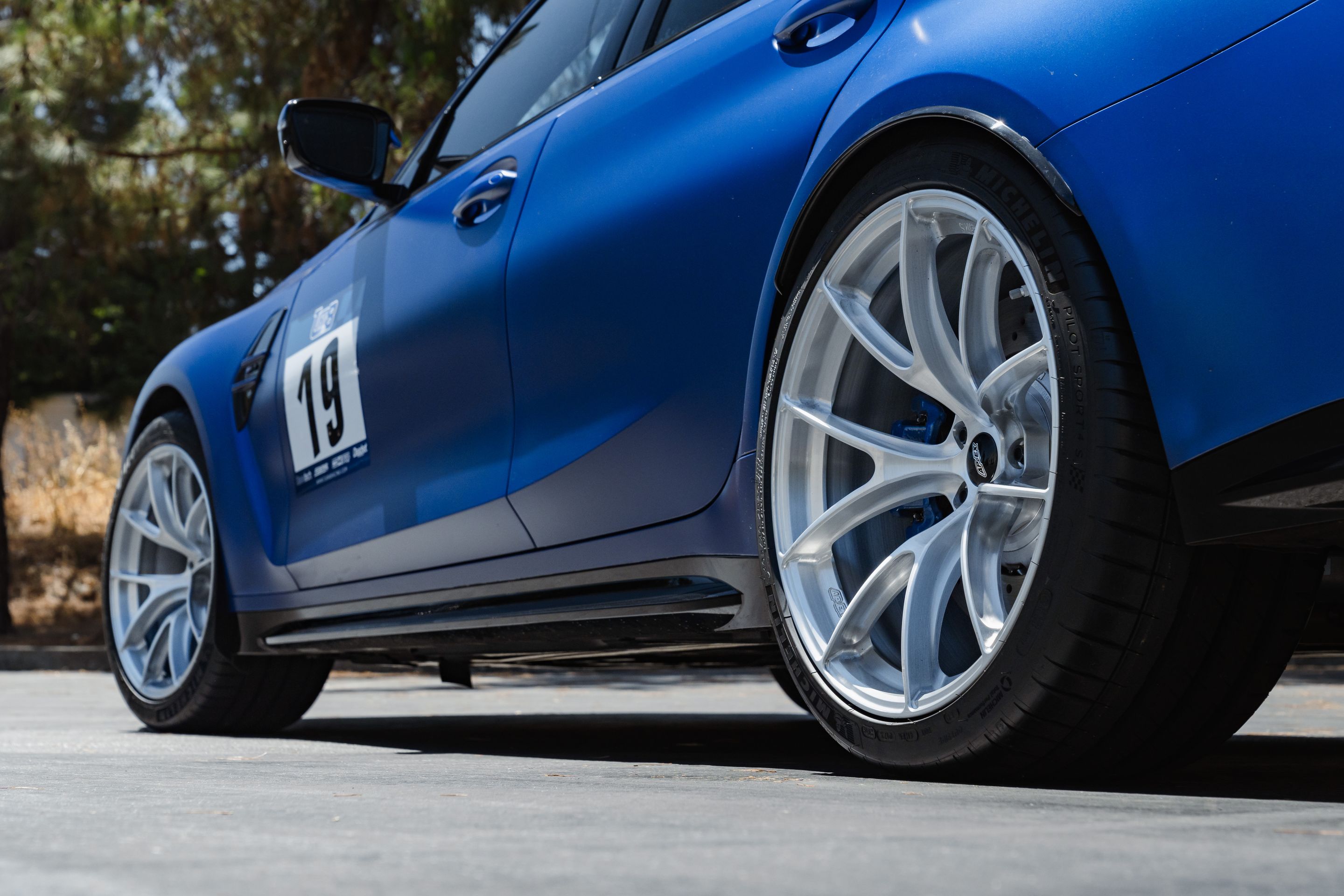 Blue BMW G80 M3 with 19"/20" VS-5RS Apex wheels in Brushed Clear