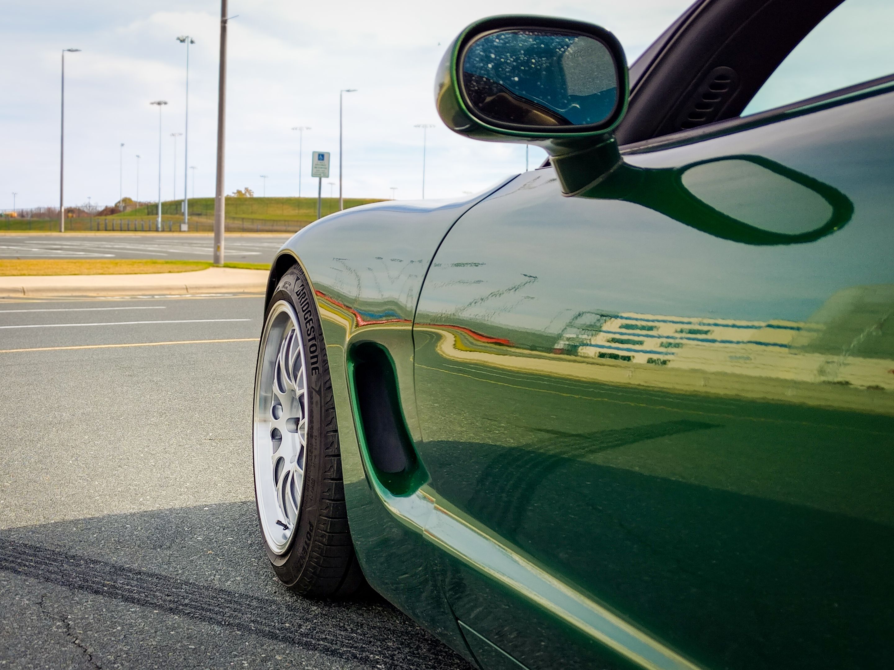 Green Chevrolet C5 Corvette Base/Z51 with 18" ML-10RT Apex wheels in Machined Lip Race Silver