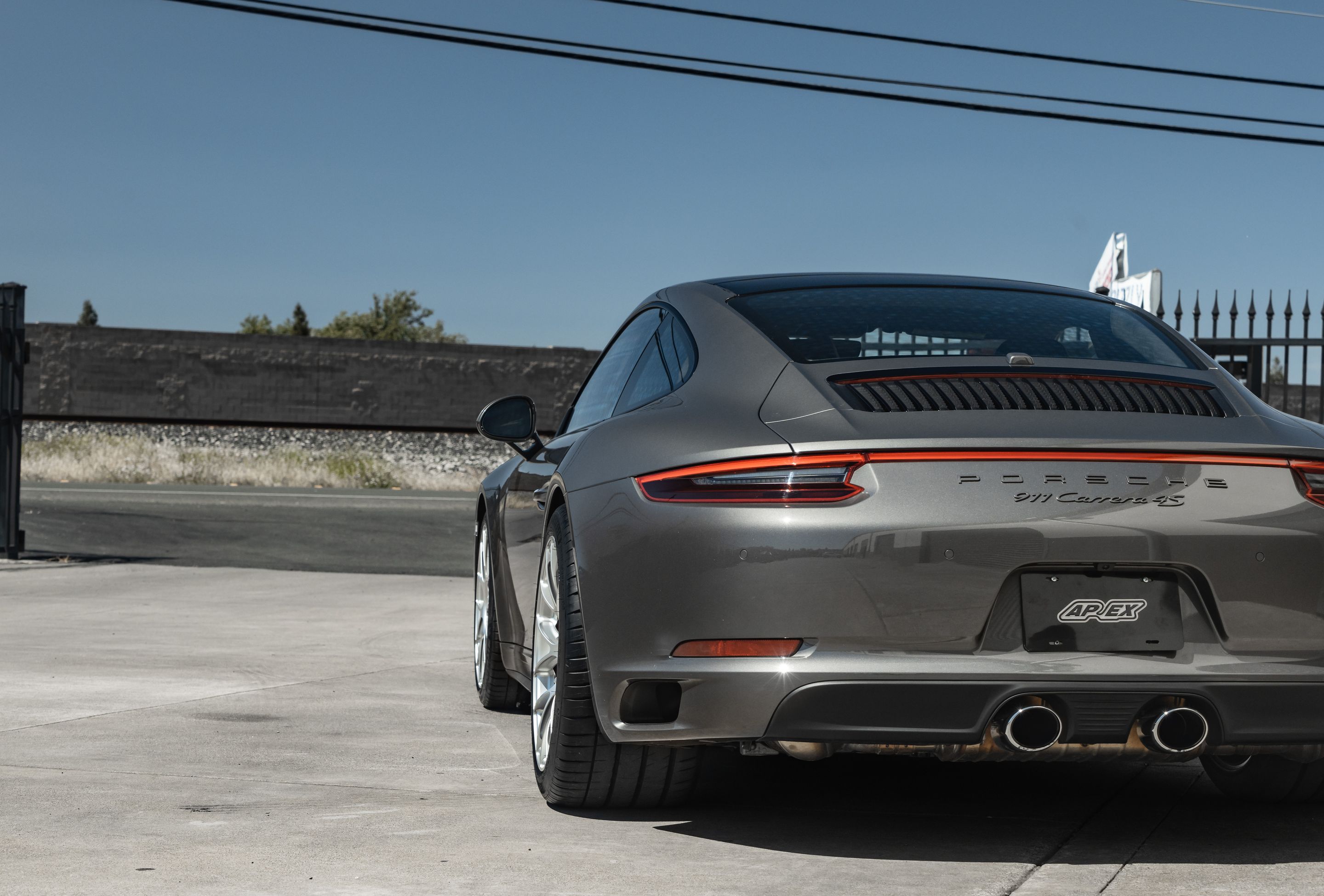Grey Porsche 911 991.2 Carrera 4S with 19" EC-7RS Apex wheels in Race Silver