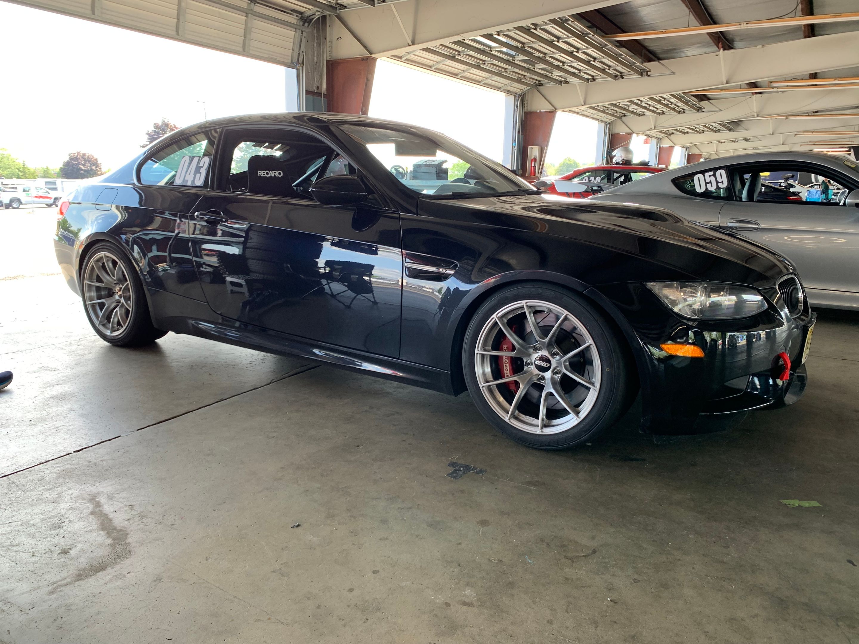 Black BMW E92 Coupe M3 with 18" VS-5RS Apex wheels in Brushed Clear