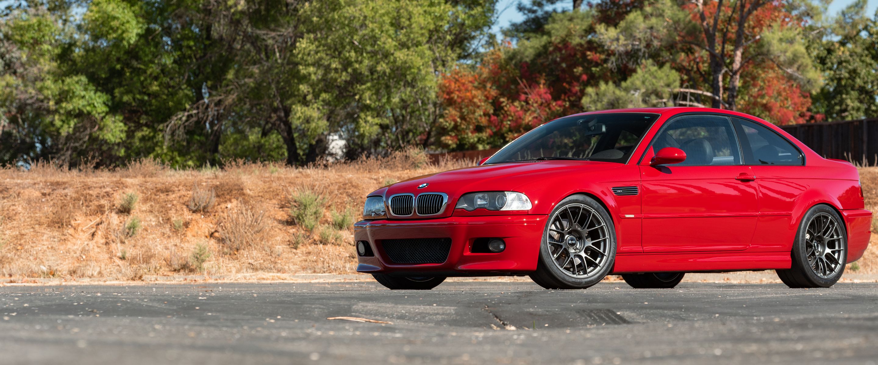 Red BMW E46 M3 with 18" EC-7RS Apex wheels in Anthracite