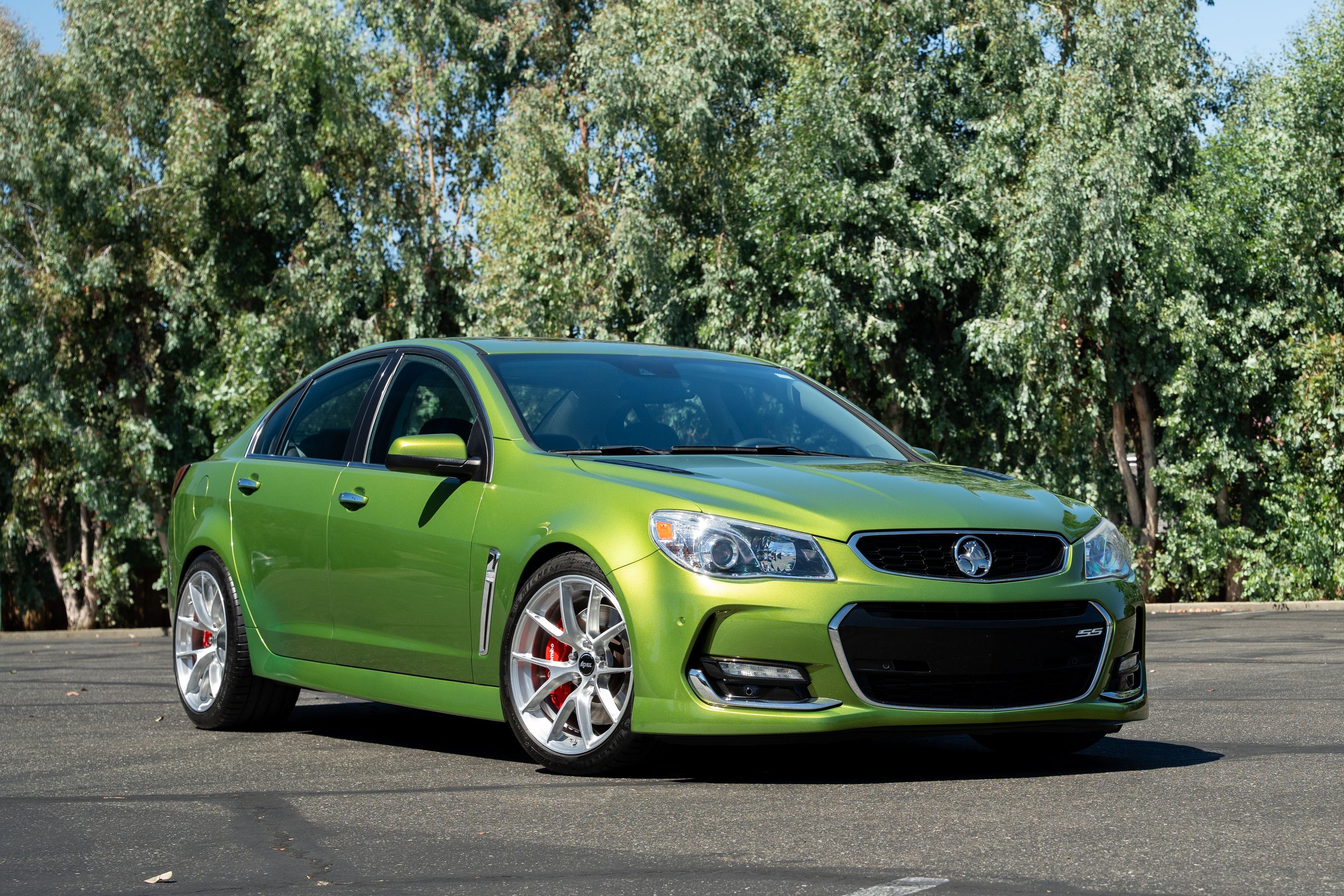 Green Chevrolet SS with 19" VS-5RS Apex wheels in Brushed Clear
