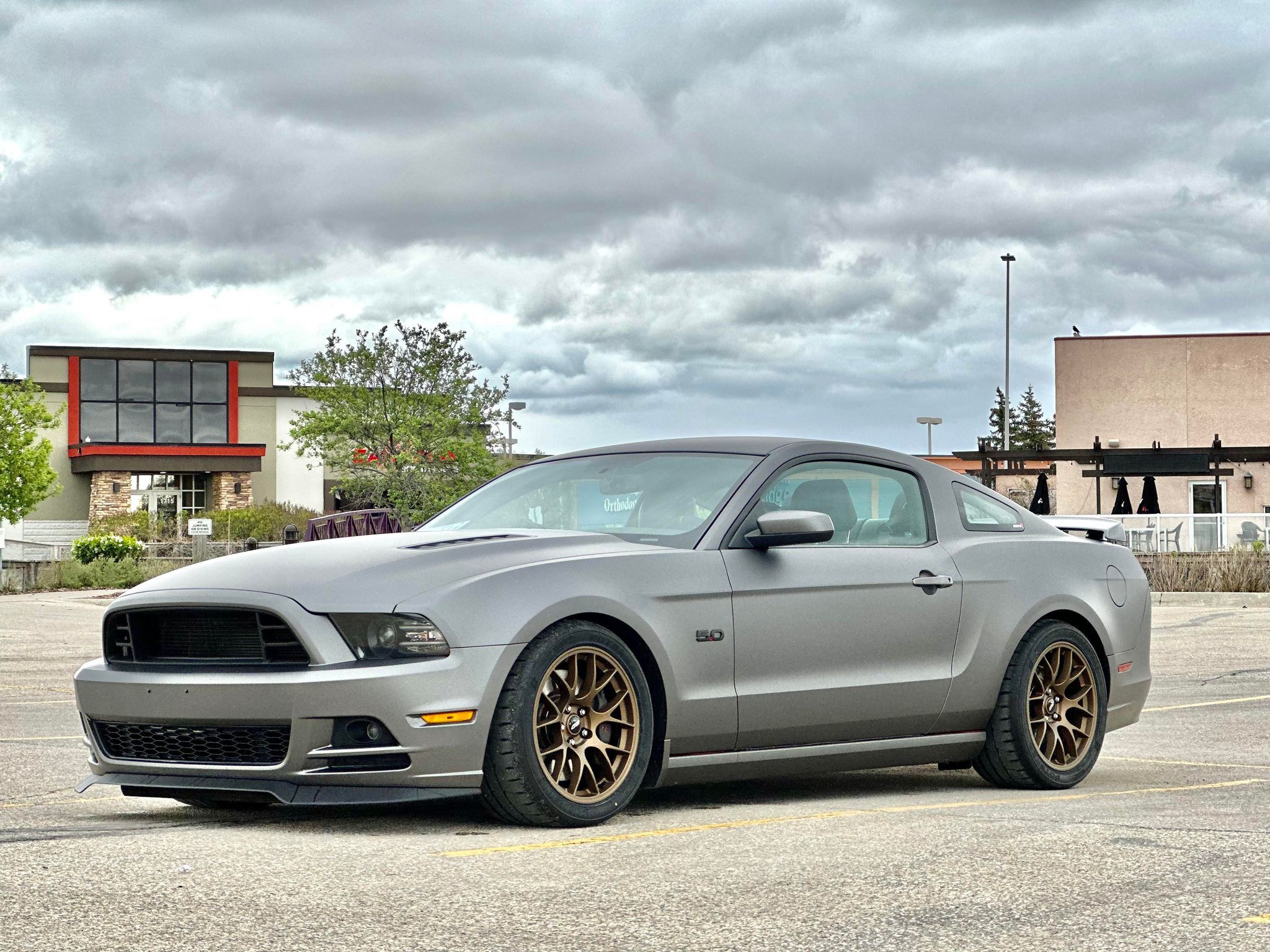 Grey Ford S197 Mustang GT with 18" EC-7 Apex wheels in Satin Bronze