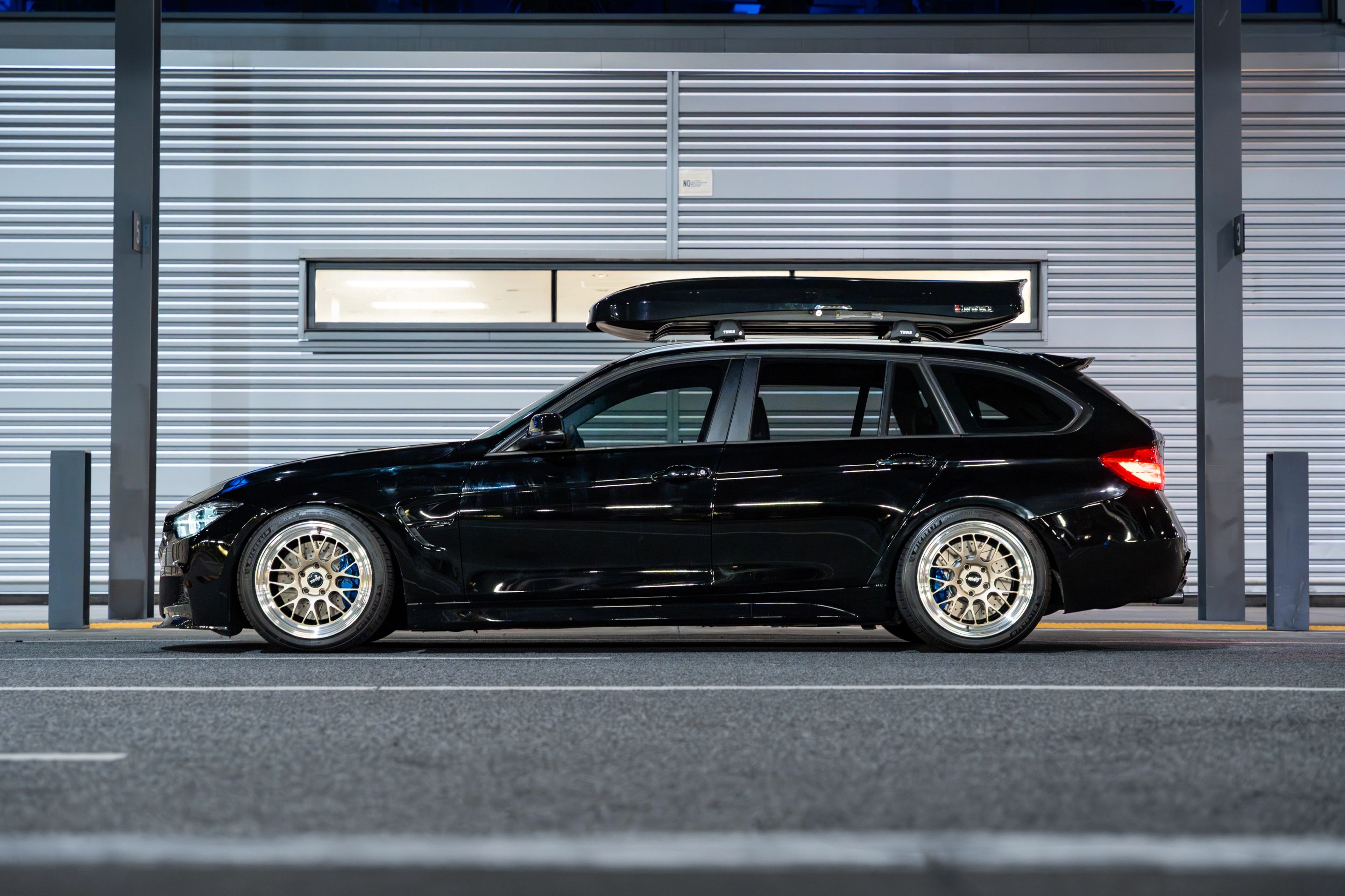 Black BMW F31 Wagon 3 Series with 18" ML-10RT Apex wheels in Machined Lip Gloss Motorsport Gold