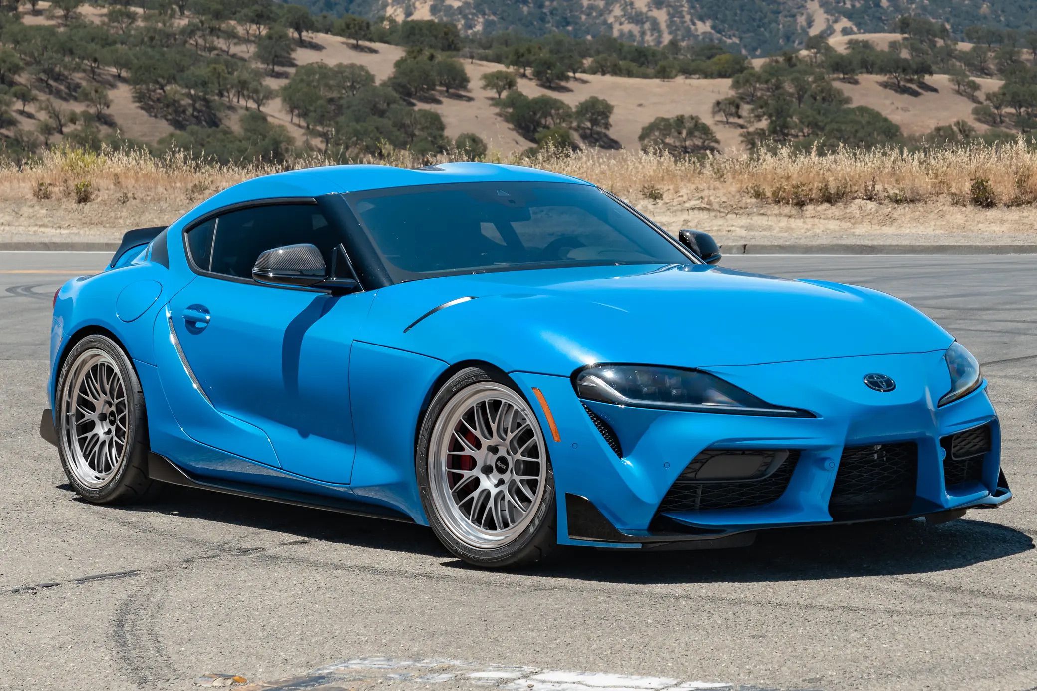 Blue Toyota GR Supra with 19" ML-10RT Apex wheels in Machined Lip Race Silver