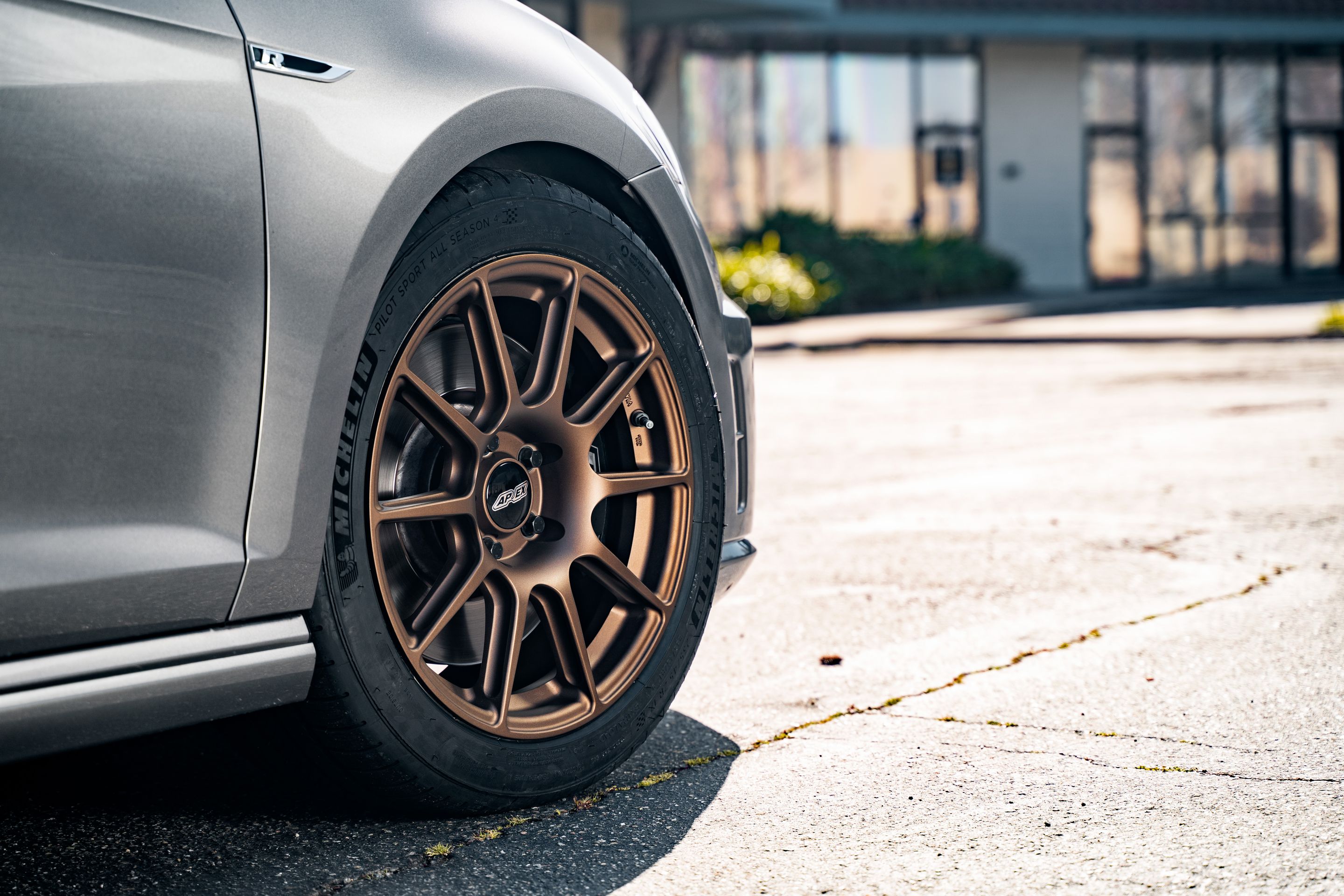 Grey VW MK7 Golf R with 17" SM-10 Apex wheels in Satin Bronze
