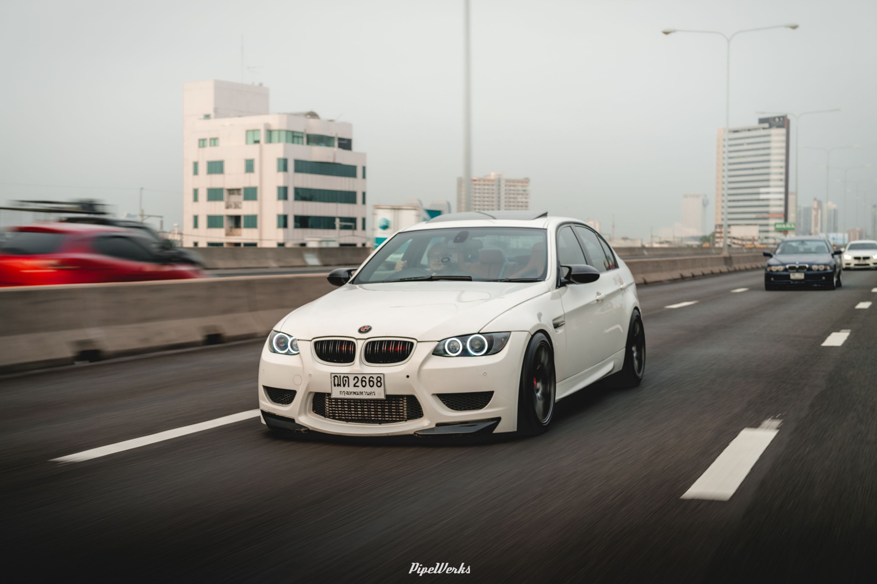 White BMW E90 Sedan 3 Series with 18" EC-7 Apex wheels in Anthracite