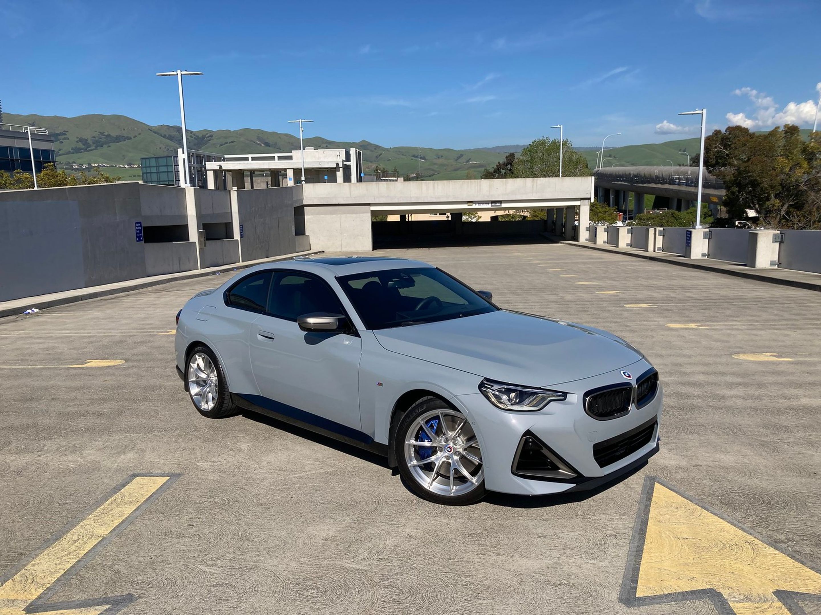 Grey BMW G42 2 Series with 19" VS-5RS Apex wheels in Brushed Clear