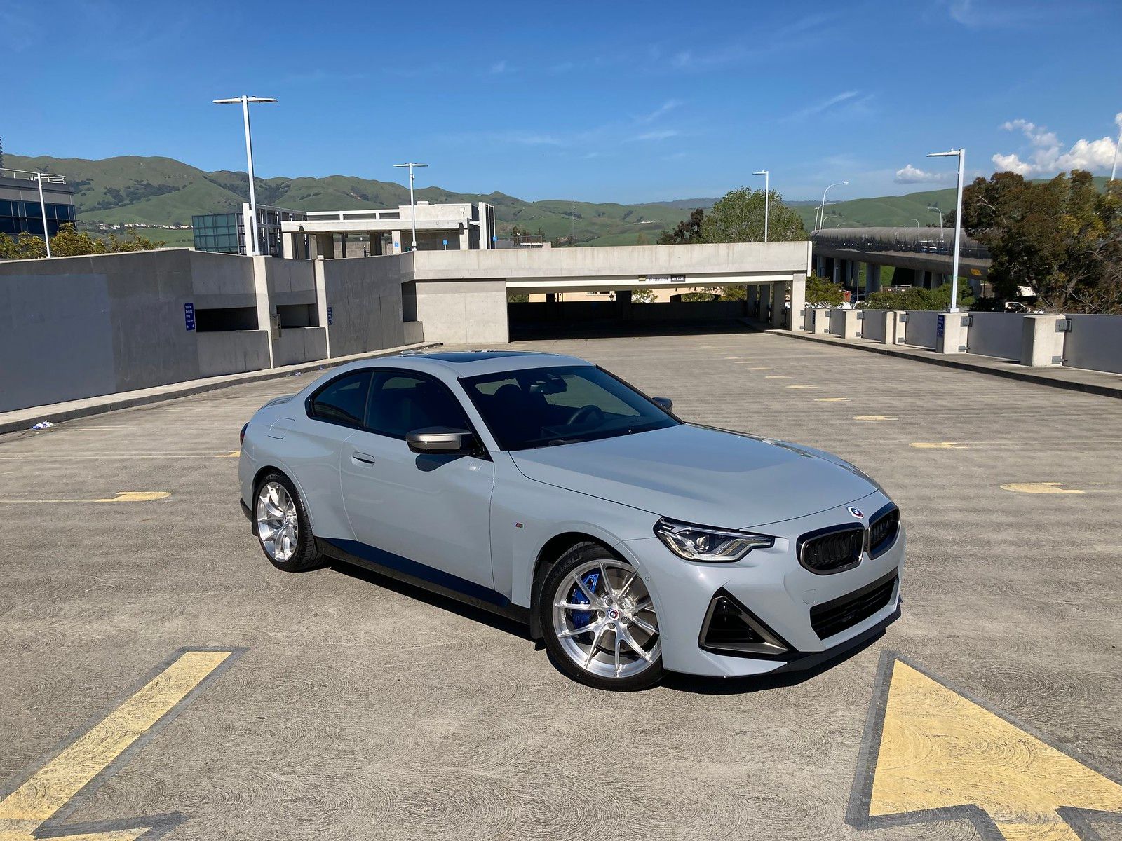 Grey BMW G42 2 Series with 19" VS-5RS Apex wheels in Brushed Clear