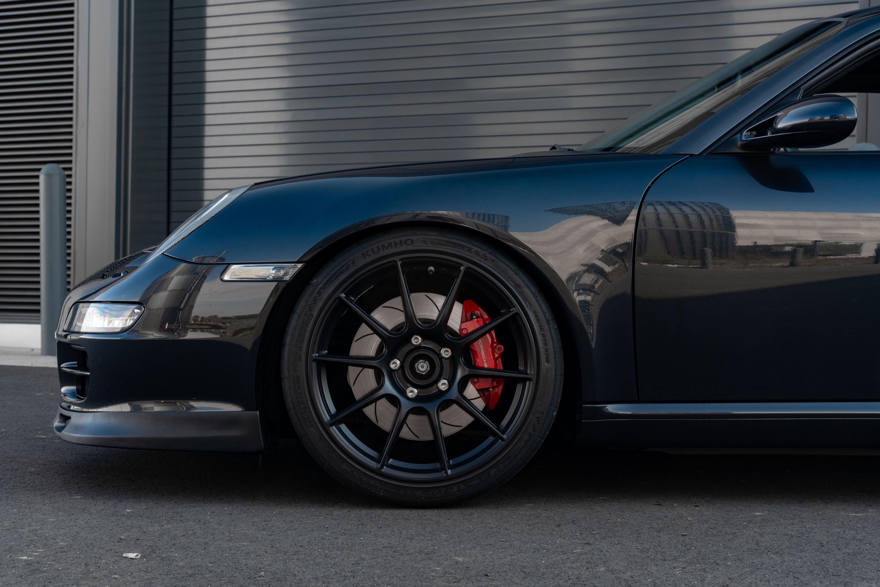 Grey Porsche 911 997 Carrera S with 19" SM-10 Apex wheels in Satin Black