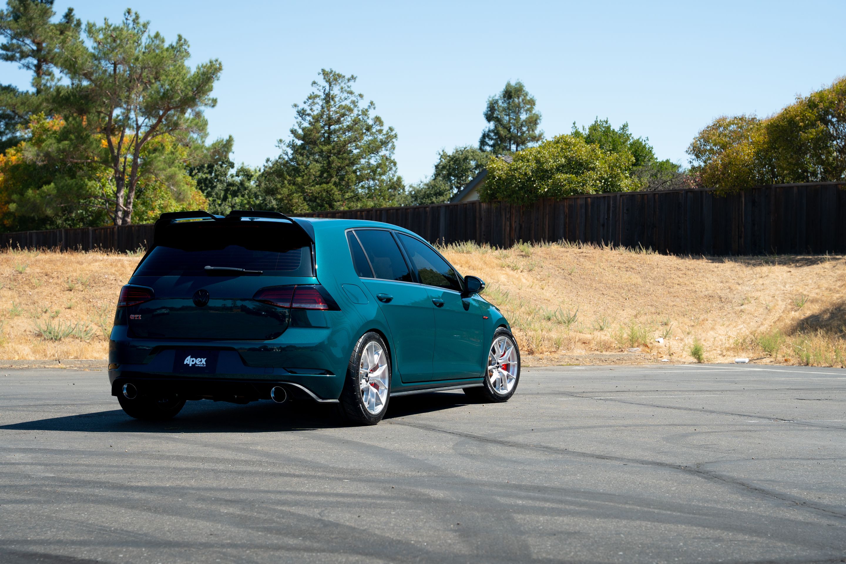 Green VW MK7 GTI with 17" VS-5RS Apex wheels in Brushed Clear